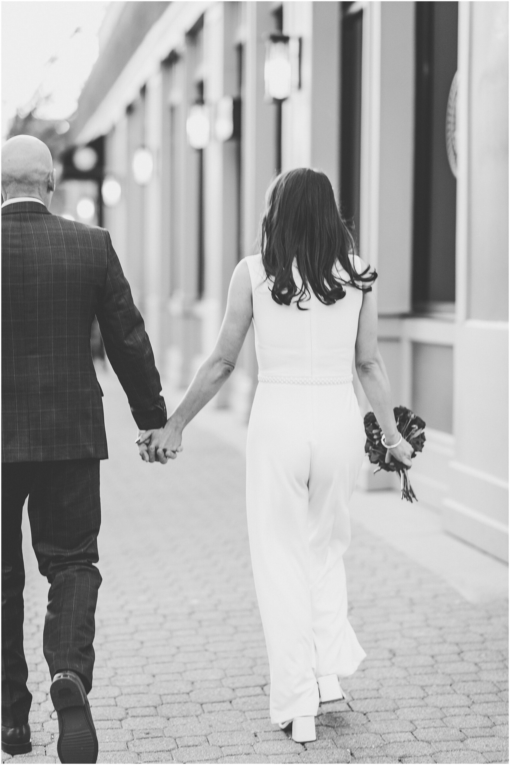 Tania & Zachary's intimate wedding day at Hamilton Walker's in Champaign, Illinois with Central Illinois photographer Kara Evans Photographer.