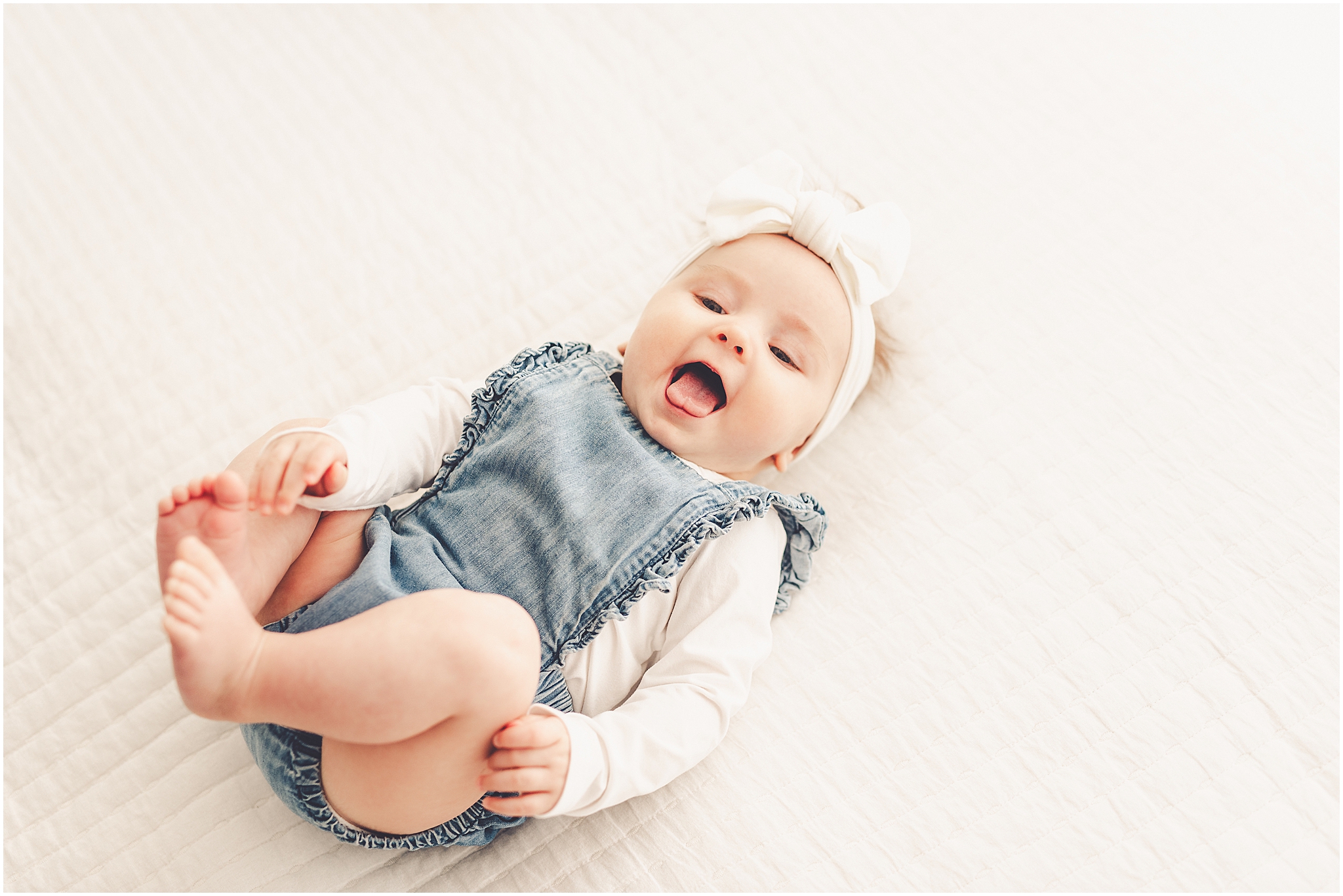 Kankakee studio four-month milestone photos at Studio 388 with Kankakee family photographer Kara Evans Photographer.