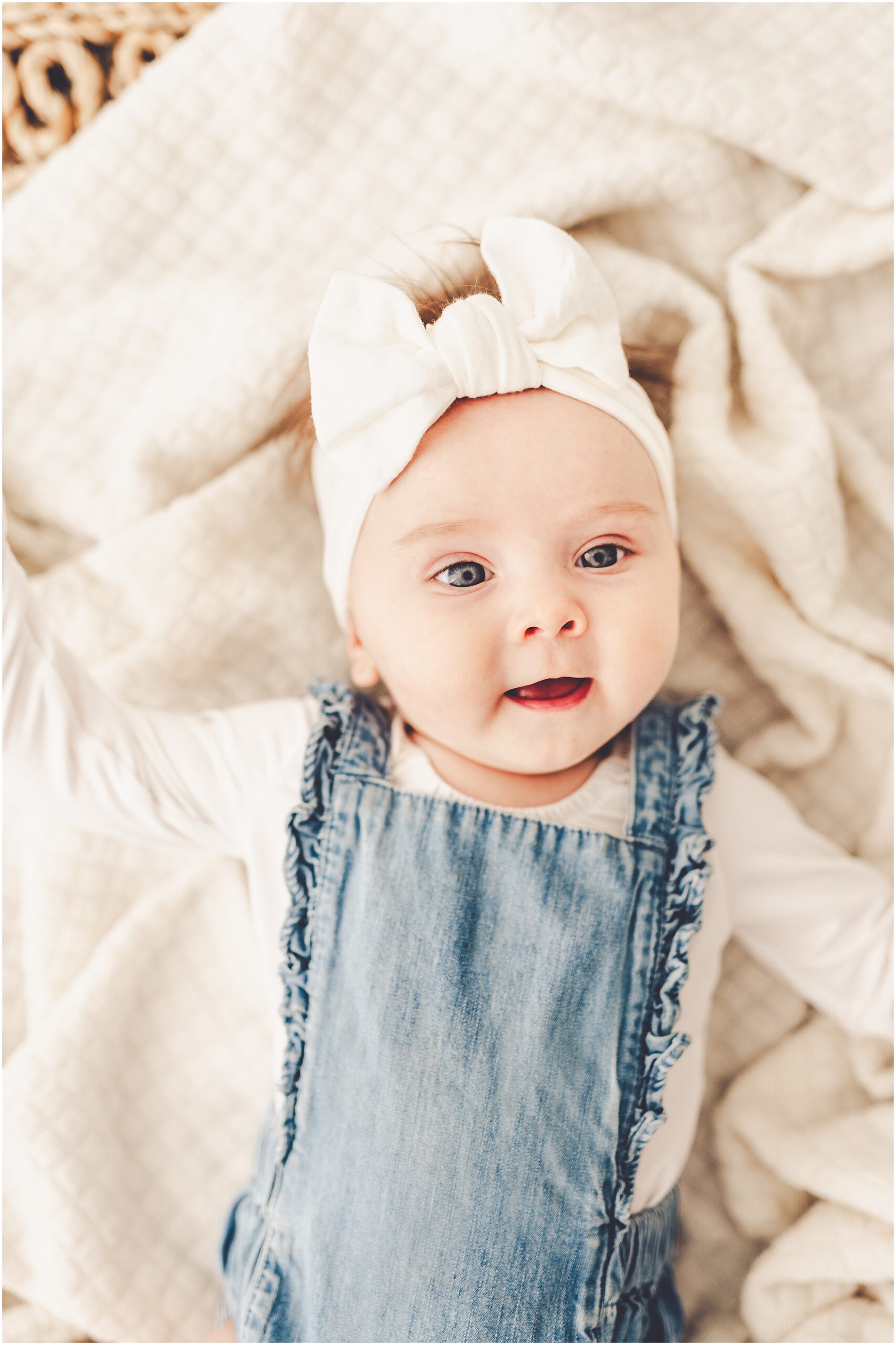 Kankakee studio four-month milestone photos at Studio 388 with Kankakee family photographer Kara Evans Photographer.