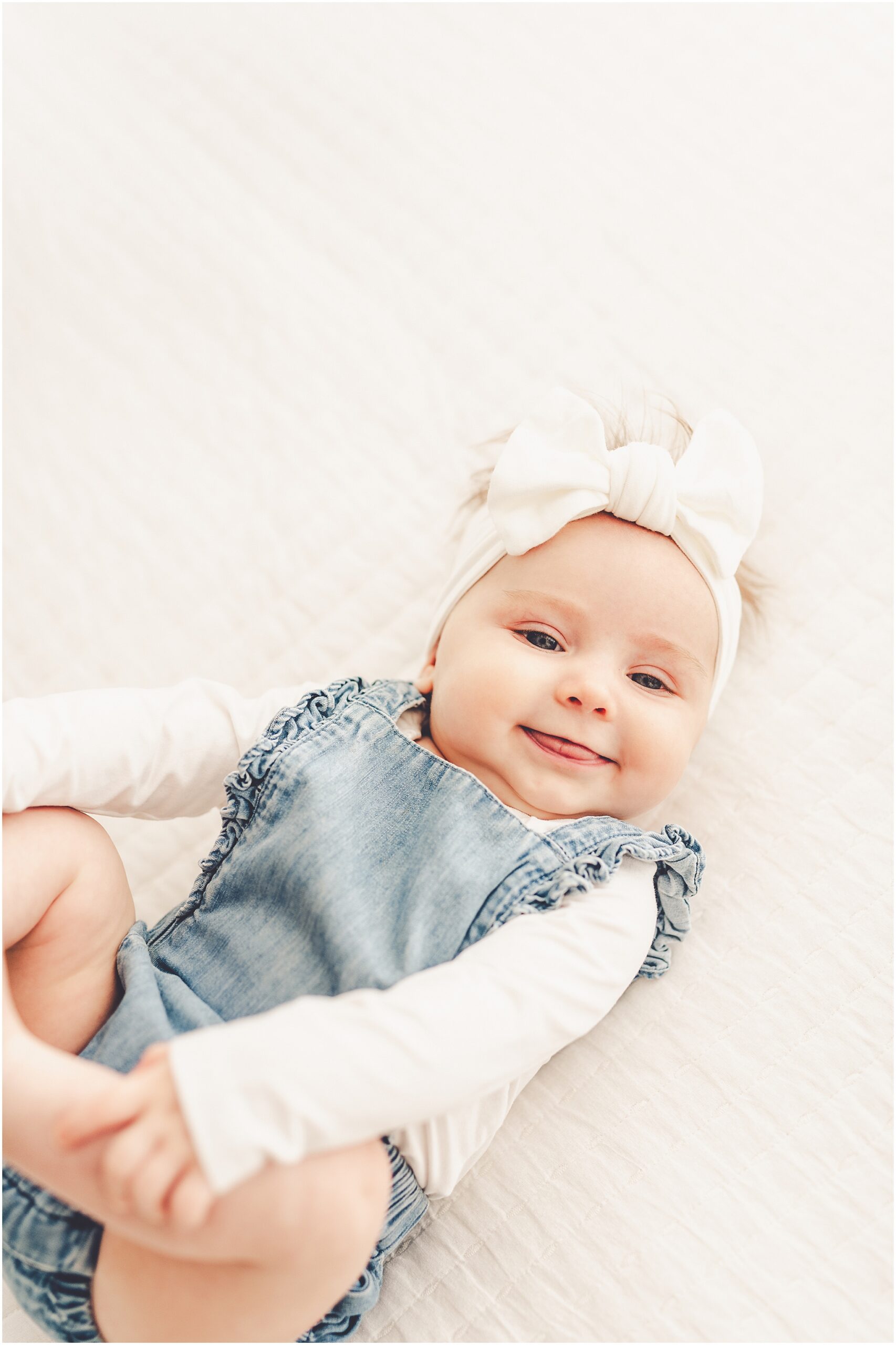 Kankakee studio four-month milestone photos at Studio 388 with Kankakee family photographer Kara Evans Photographer.