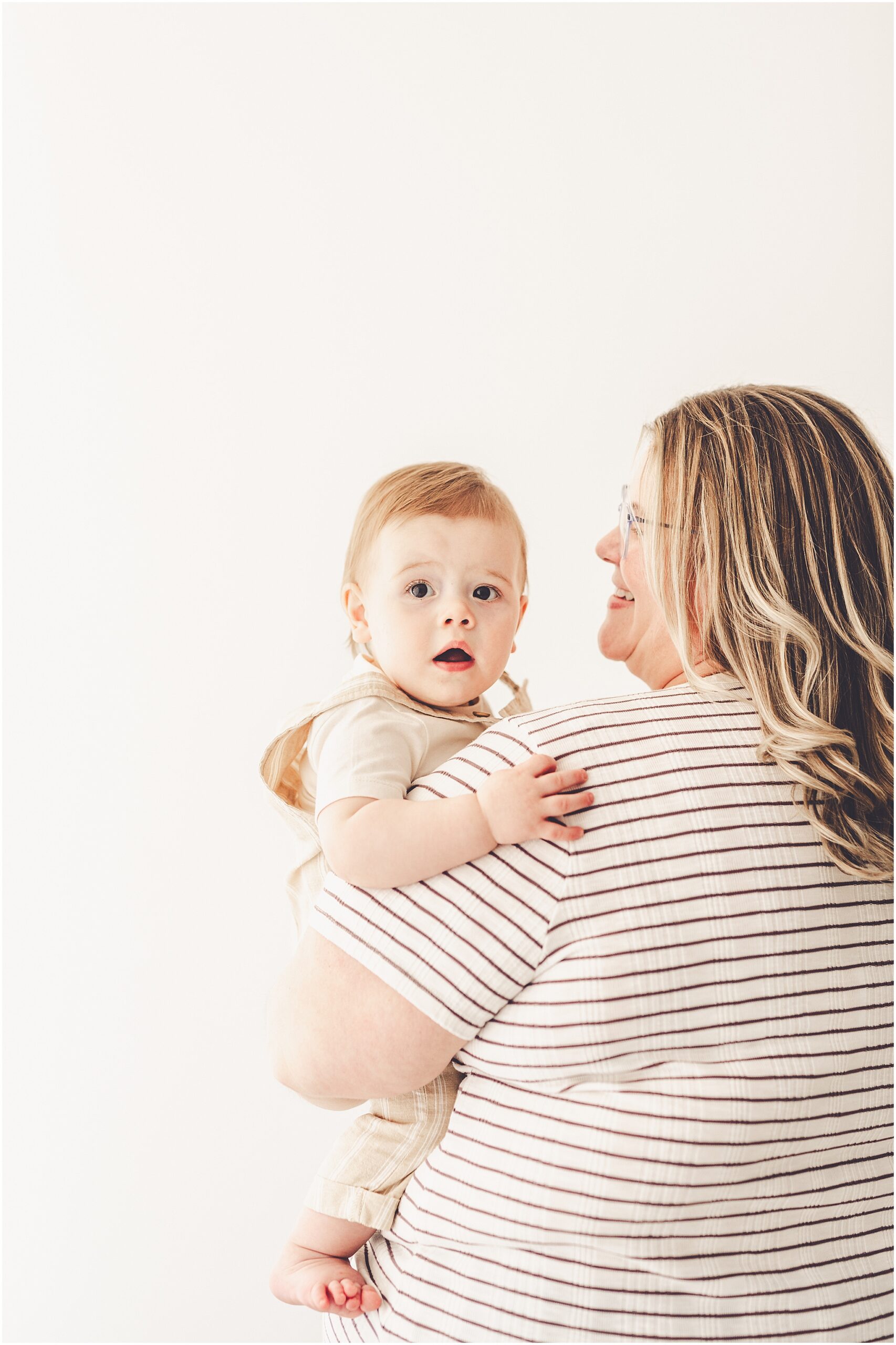 Inspiration for studio one-year milestone photos at Studio 388 in Kankakee with Kankakee family photographer Kara Evans Photographer.