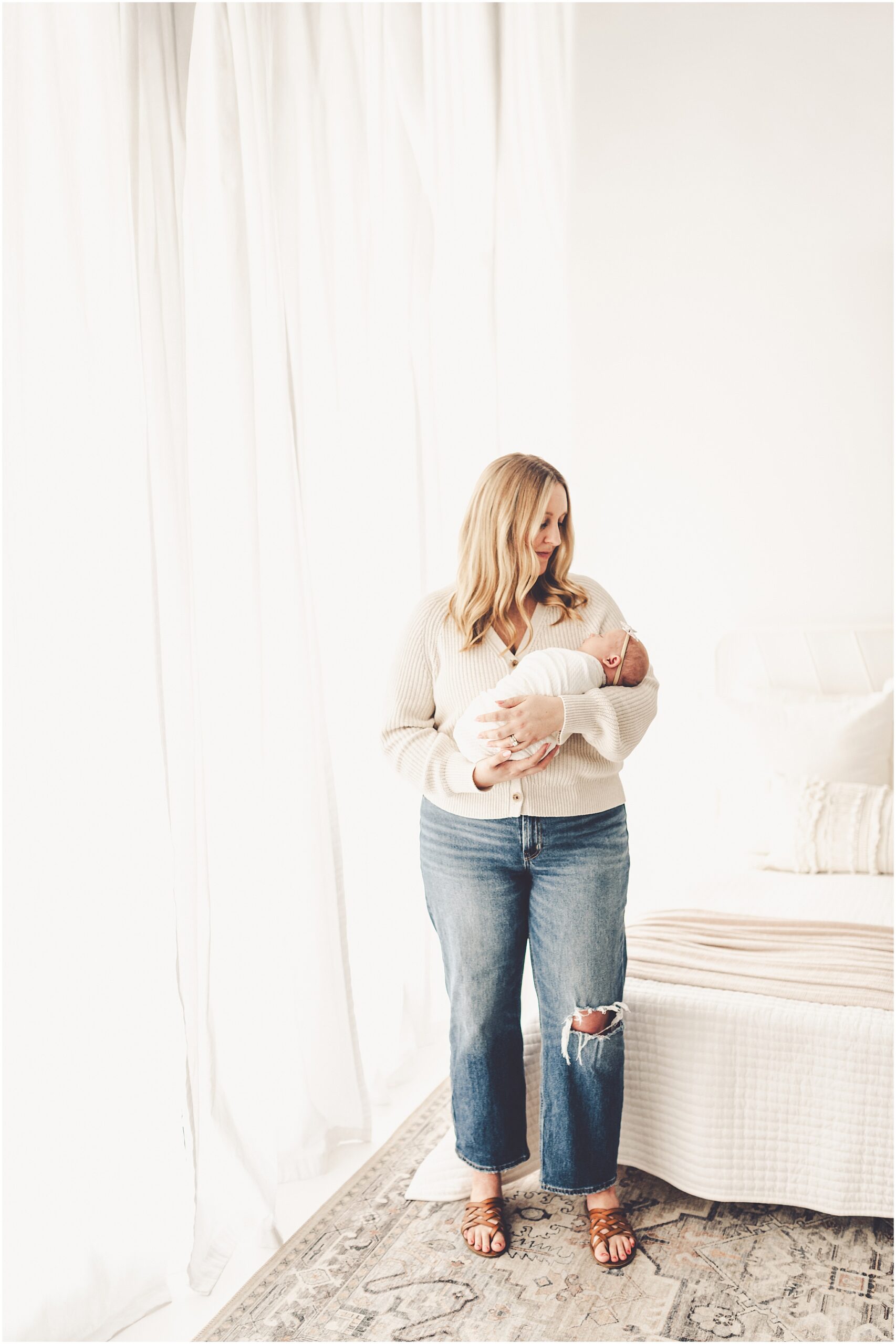 Cozy newborn photos at Studio 388 in Kankakee. Kara Evans Photographer photographs growing families in Kankakee & Iroquois County.