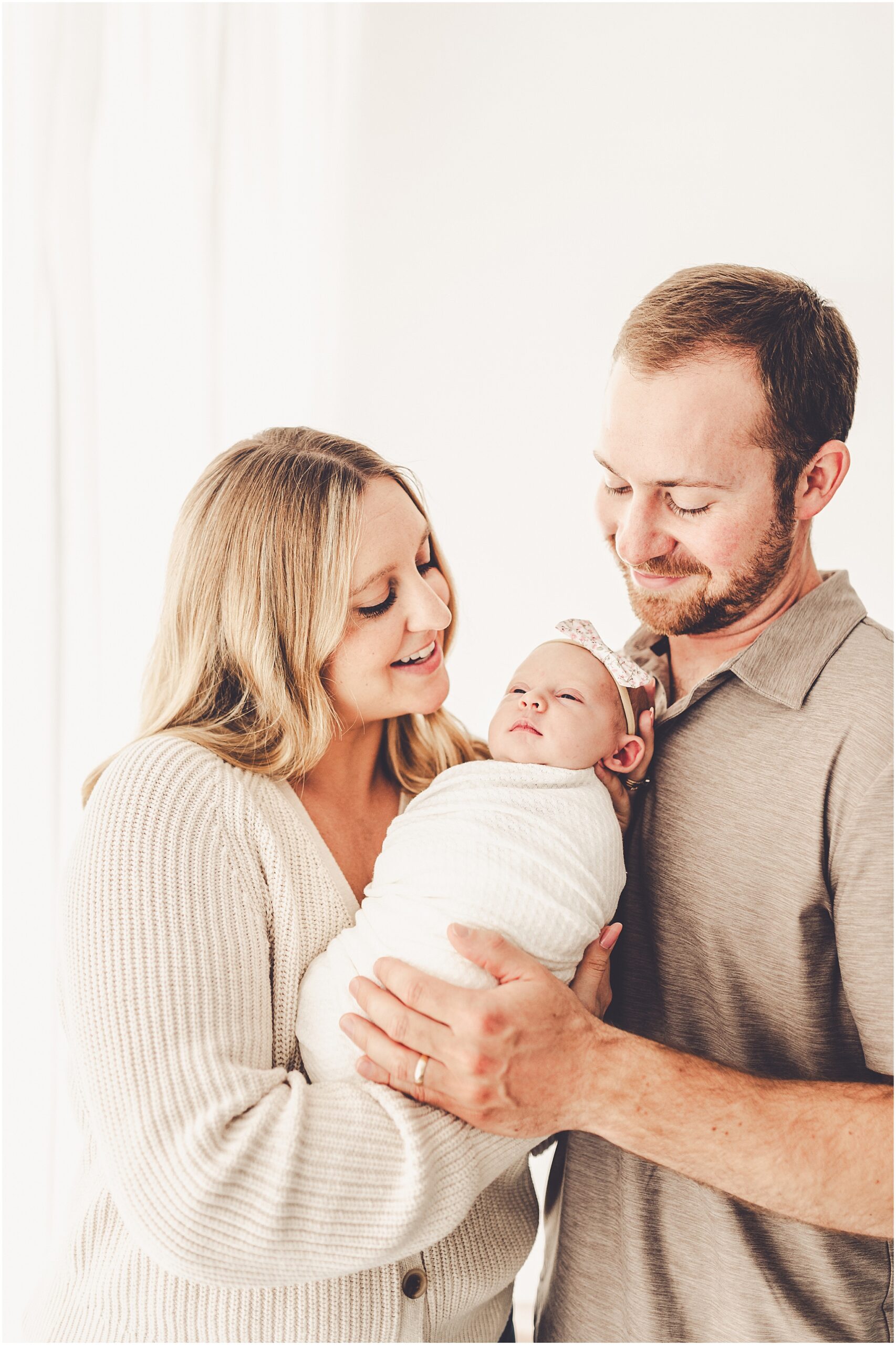 Cozy newborn photos at Studio 388 in Kankakee. Kara Evans Photographer photographs growing families in Kankakee & Iroquois County.