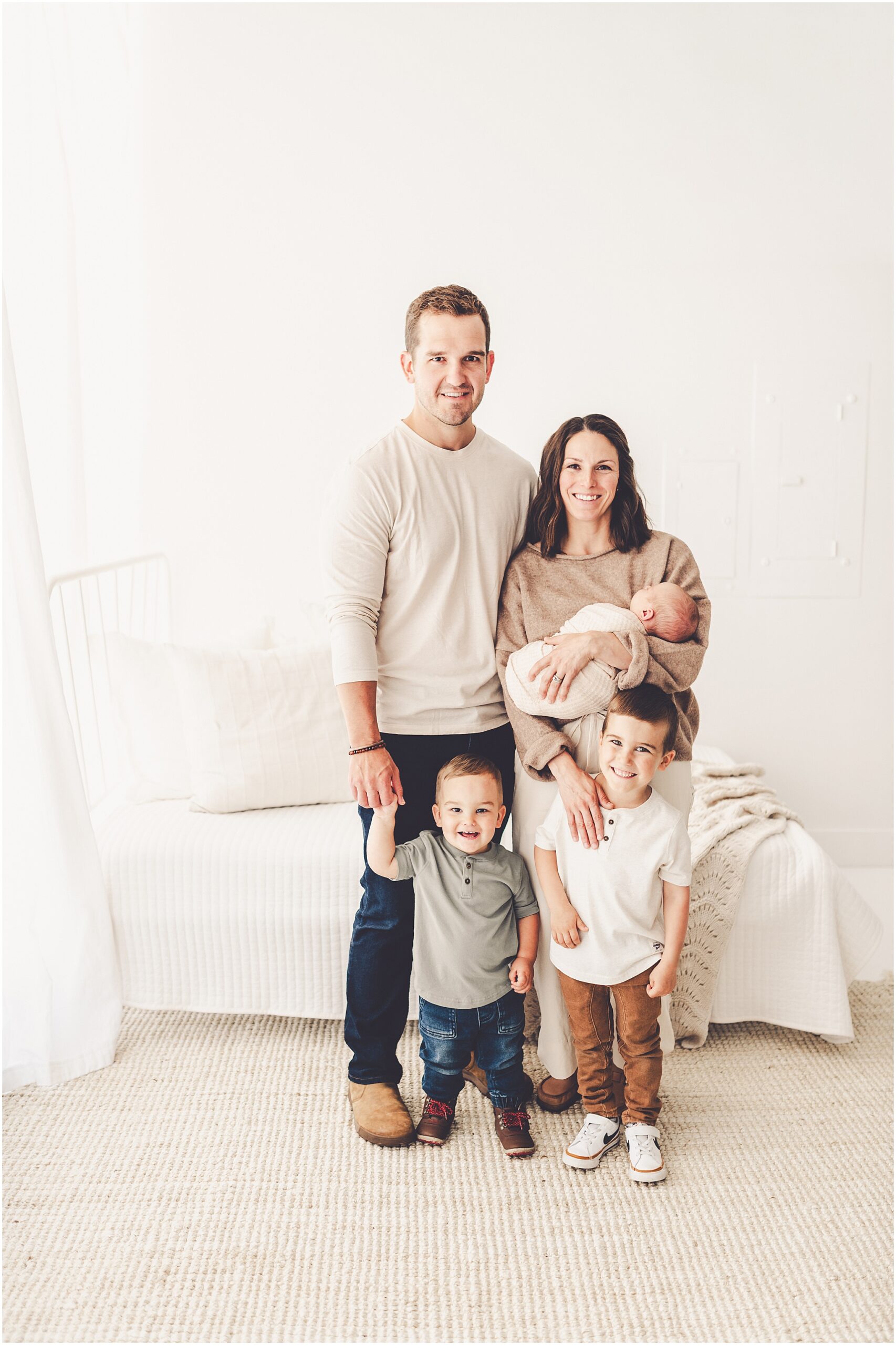 Kara Evans Photographer offers a Kankakee studio newborn session experience focused on beautifully documenting your growing family.