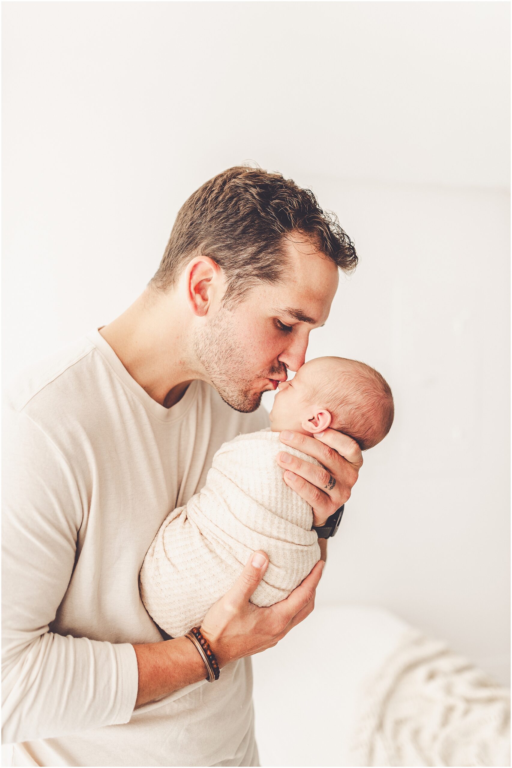 Kara Evans Photographer offers a Kankakee studio newborn session experience focused on beautifully documenting your growing family.