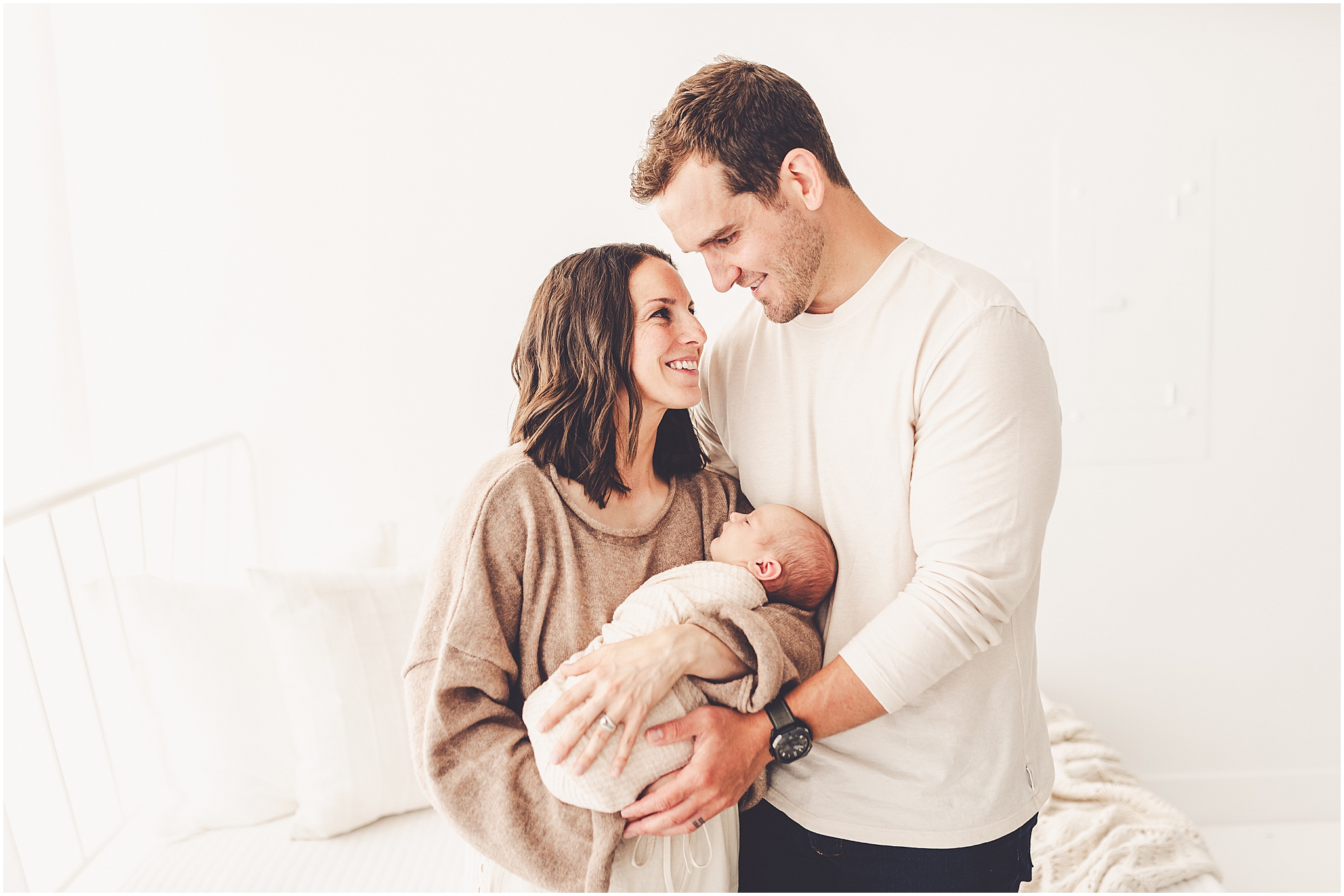 Kara Evans Photographer offers a Kankakee studio newborn session experience focused on beautifully documenting your growing family.
