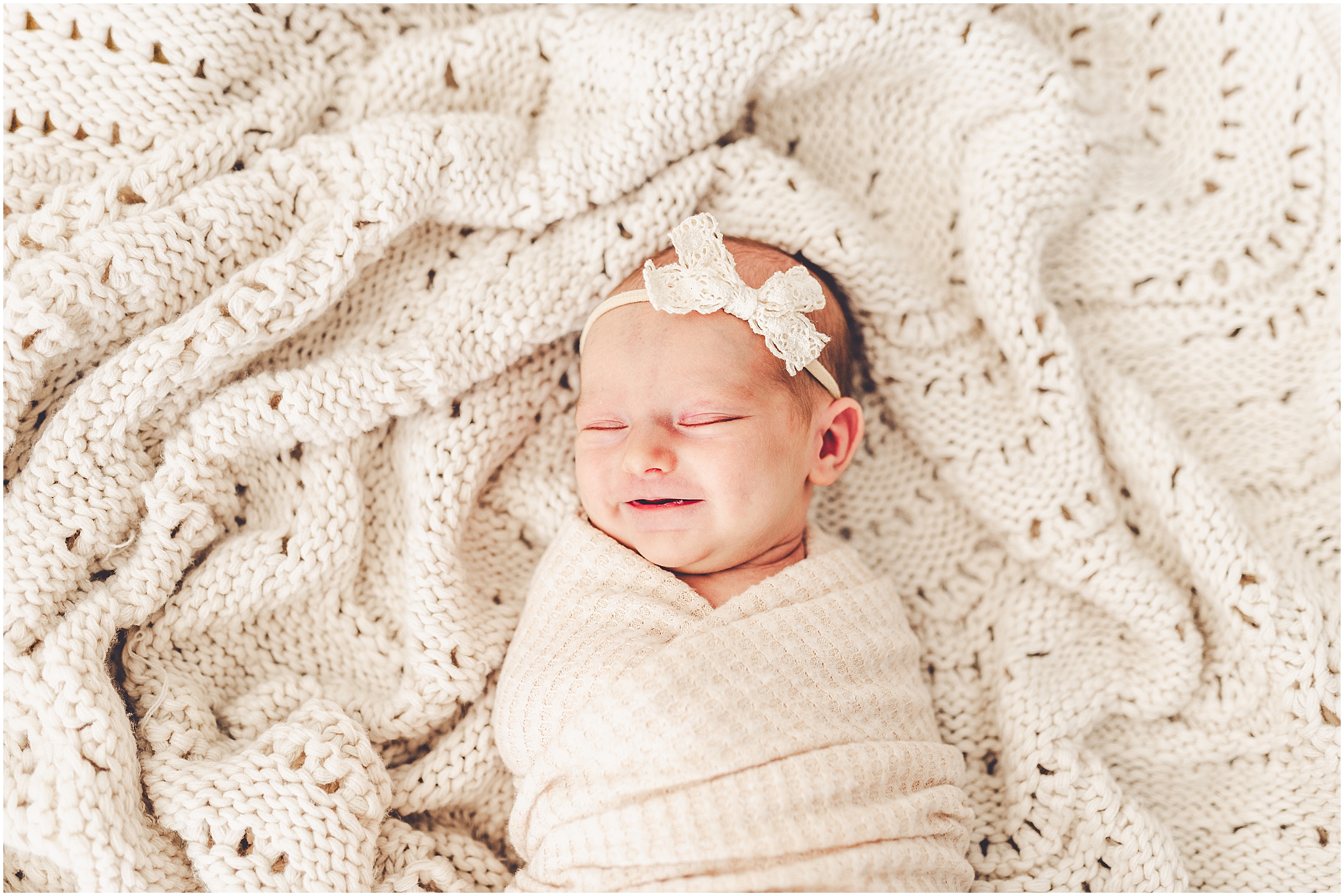Kara Evans Photographer offers a Kankakee studio newborn session experience focused on beautifully documenting your growing family.