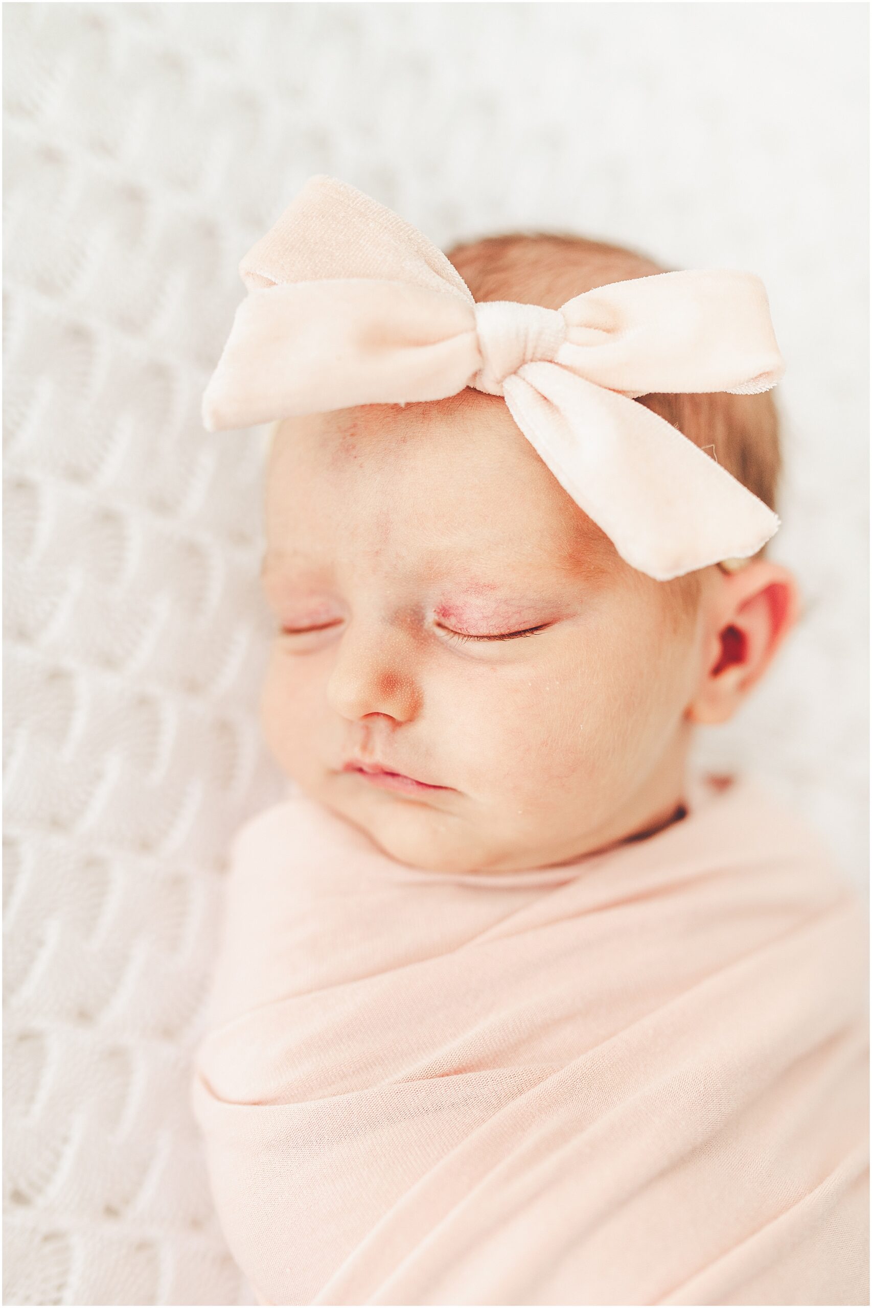 Kara Evans Photographer offers a Kankakee studio newborn session experience focused on beautifully documenting your growing family.