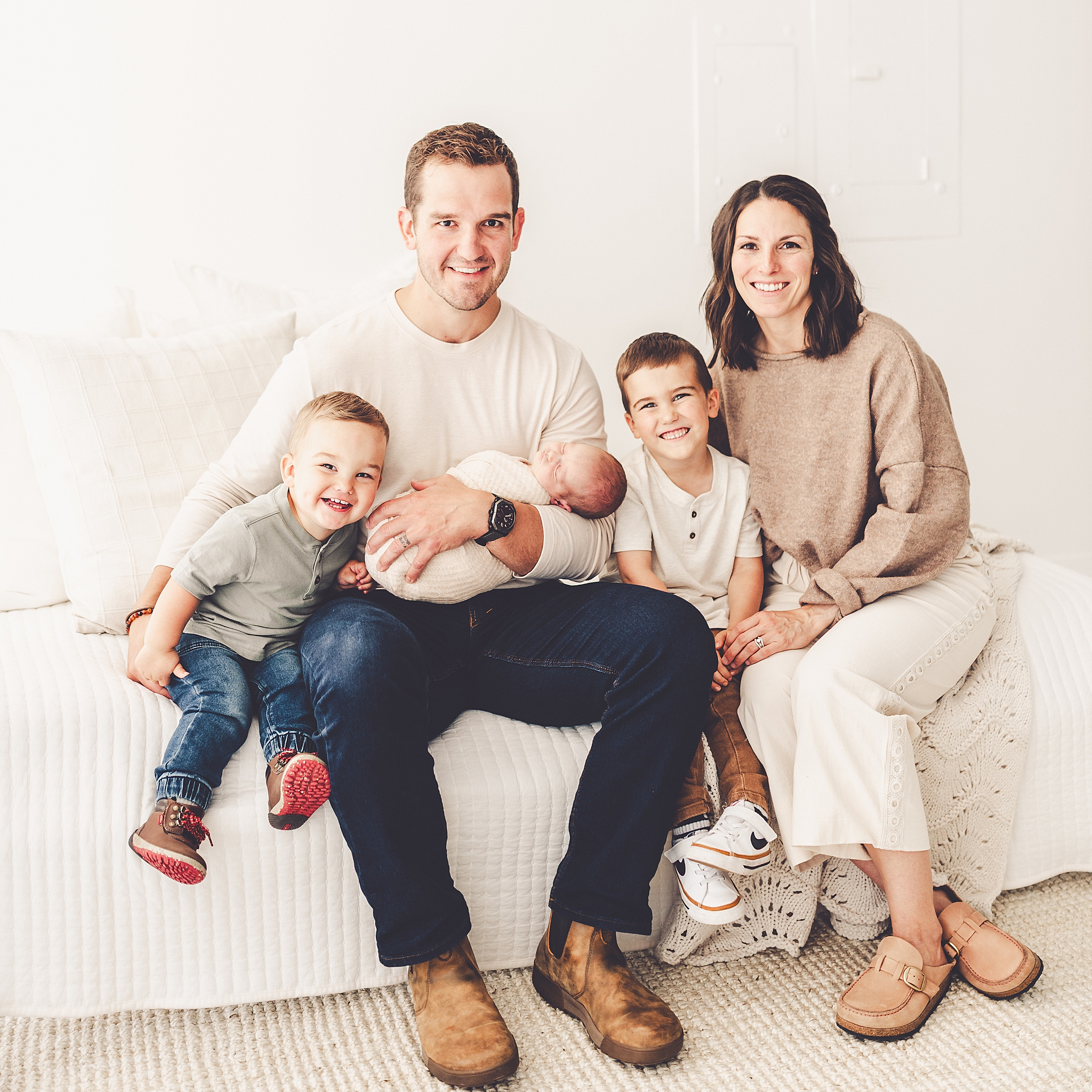Kara Evans Photographer offers a Kankakee studio newborn session experience focused on beautifully documenting your growing family.