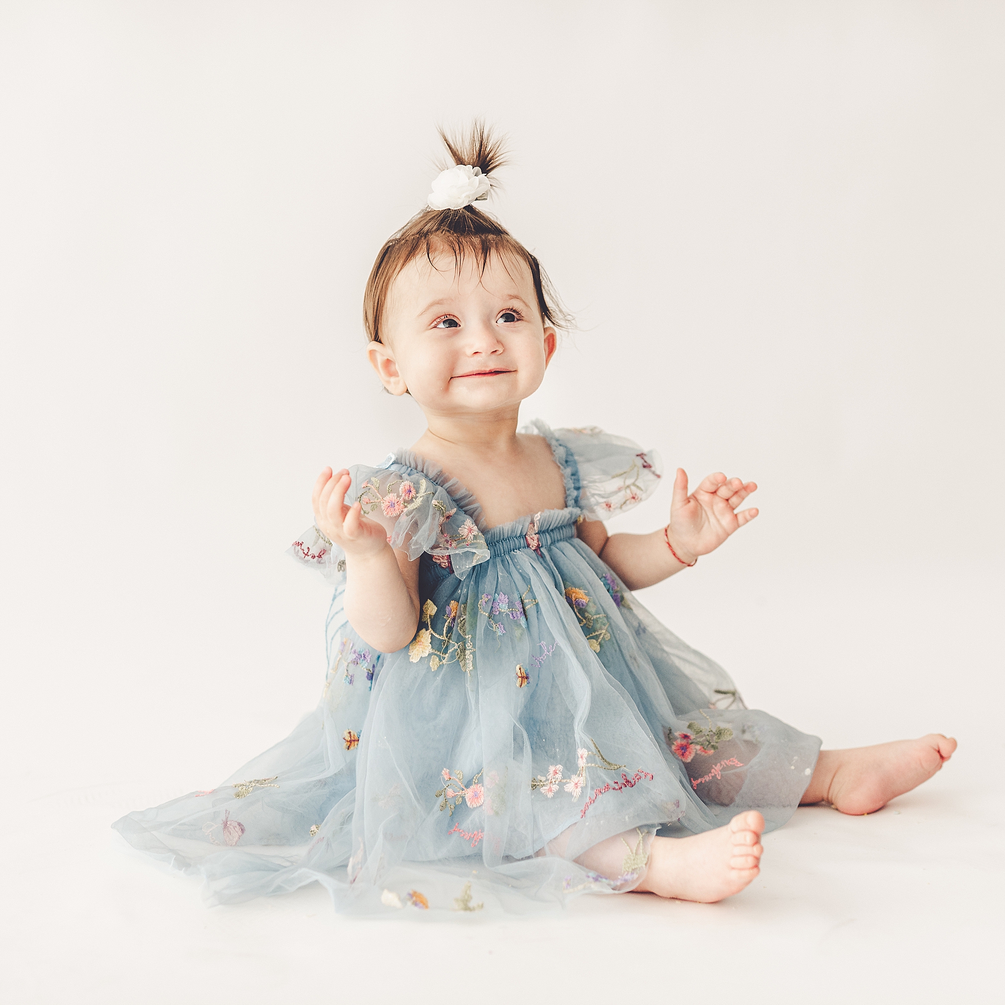 Studio one-year milestone photos at Studio 388 with Kara Evans Photographer, a Kankakee-based family photographer.