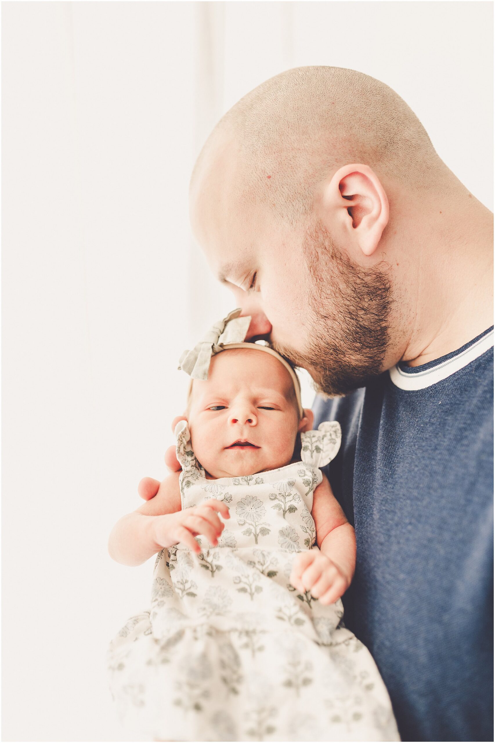 Kara Evans Photographer is a Kankakee newborn photographer based at the natural light studio, Studio 388, in downtown Kankakee, Illinois.