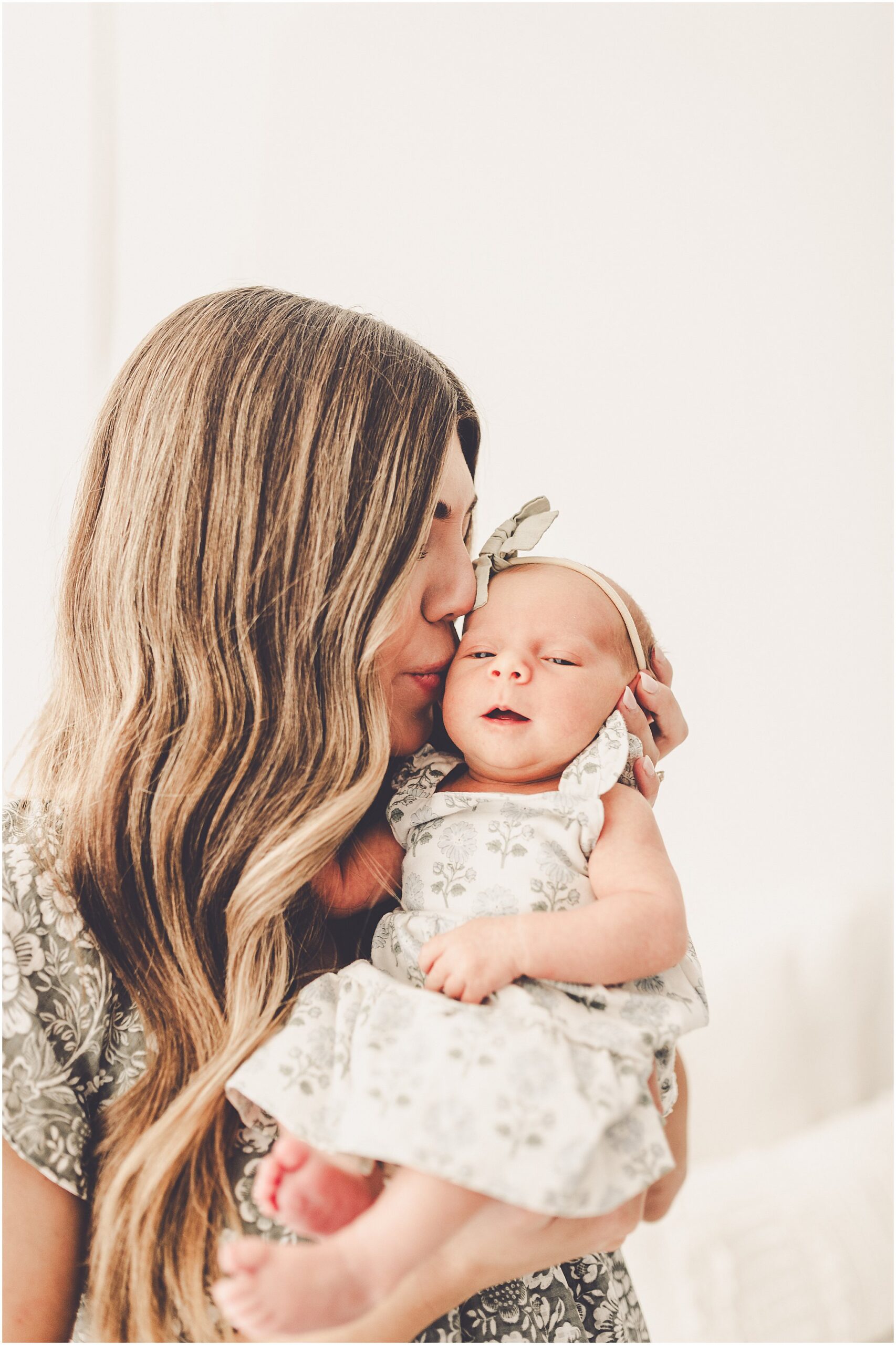 Kara Evans Photographer is a Kankakee newborn photographer based at the natural light studio, Studio 388, in downtown Kankakee, Illinois.