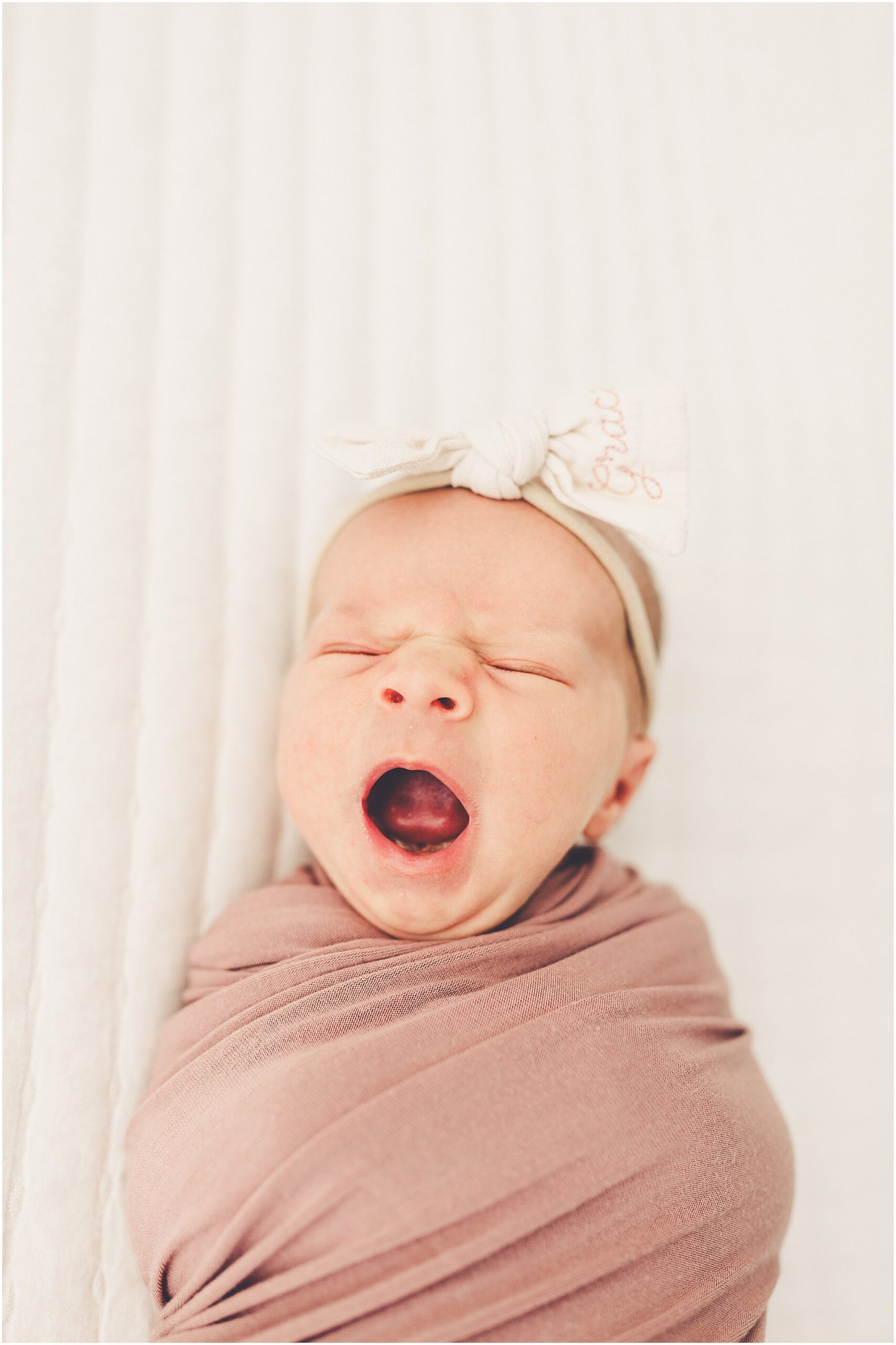 Kara Evans Photographer is a Kankakee newborn photographer based at the natural light studio, Studio 388, in downtown Kankakee, Illinois.