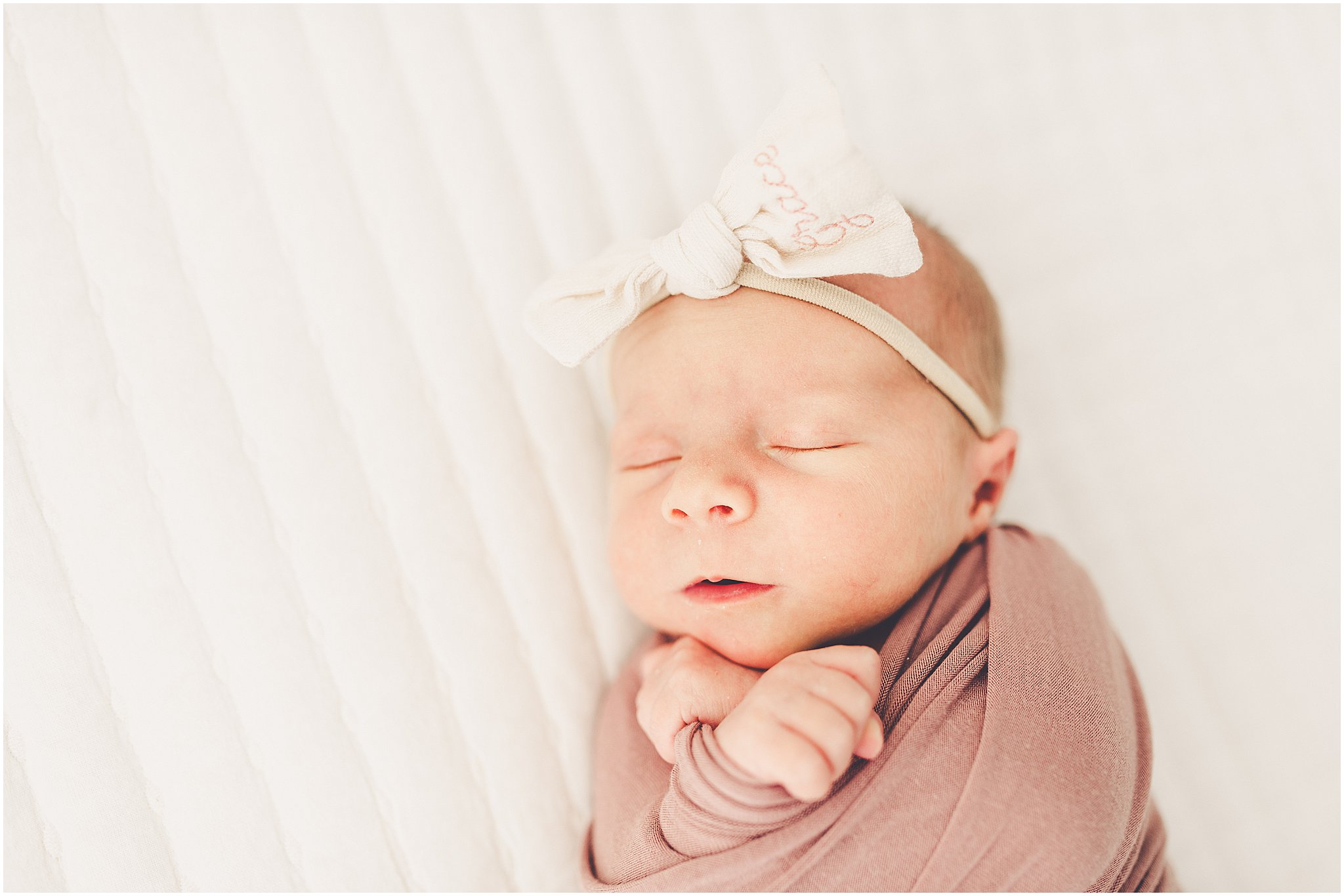 Kara Evans Photographer is a Kankakee newborn photographer based at the natural light studio, Studio 388, in downtown Kankakee, Illinois.