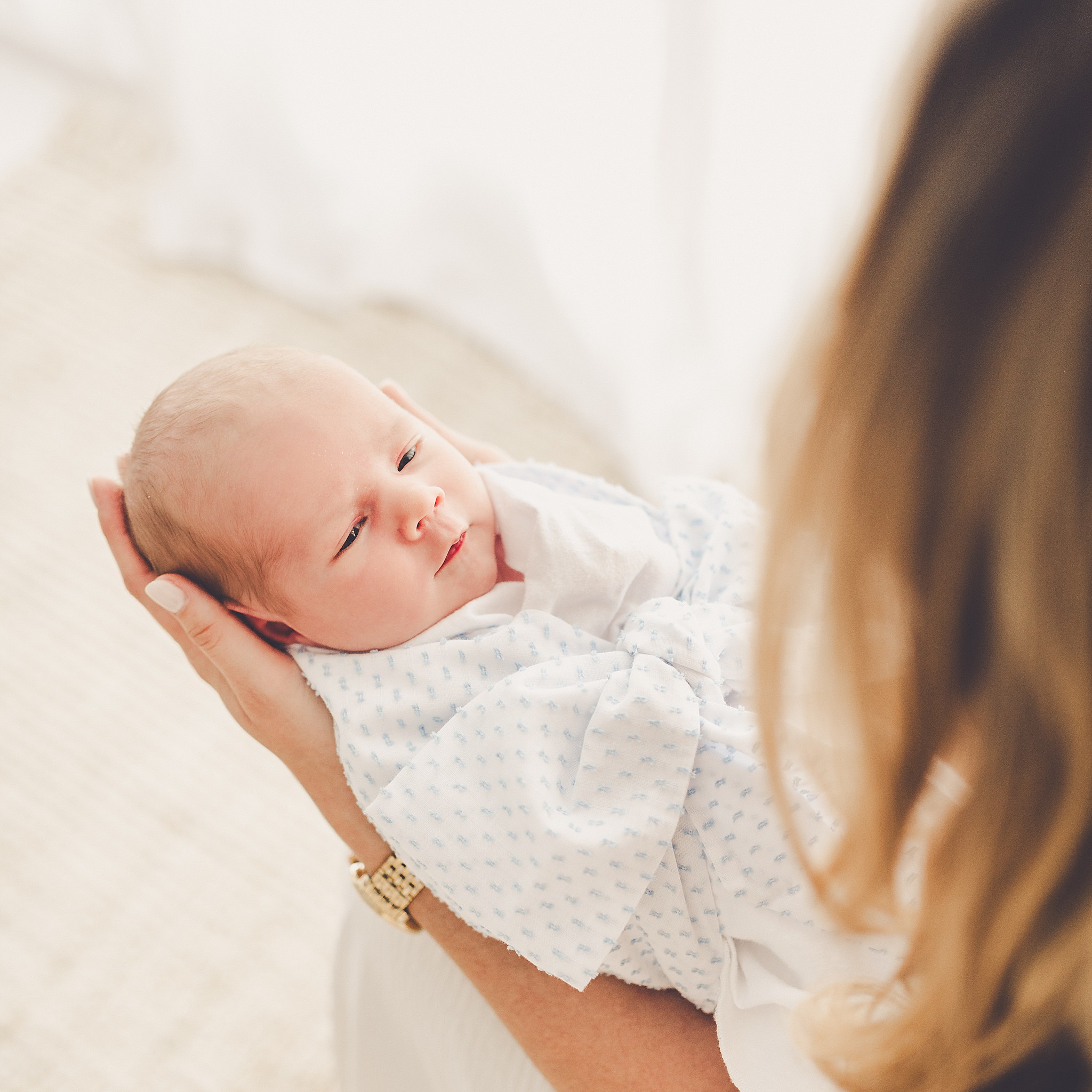Featuring Kankakee newborn photos at the natural light photography studio, Studio 388, in Kankakee, Illinois with Kara Evans Photographer.