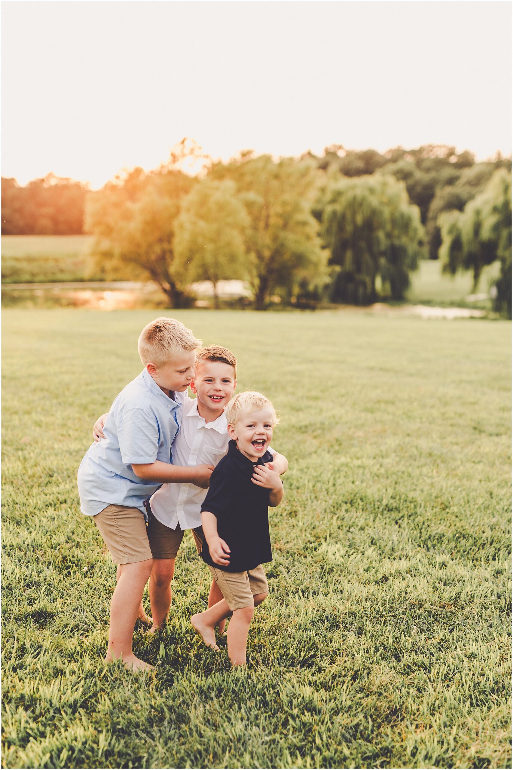 A Central Illinois summer family session with the Evans family filled with golden sunset light, backyard adventures, and genuine smiles.