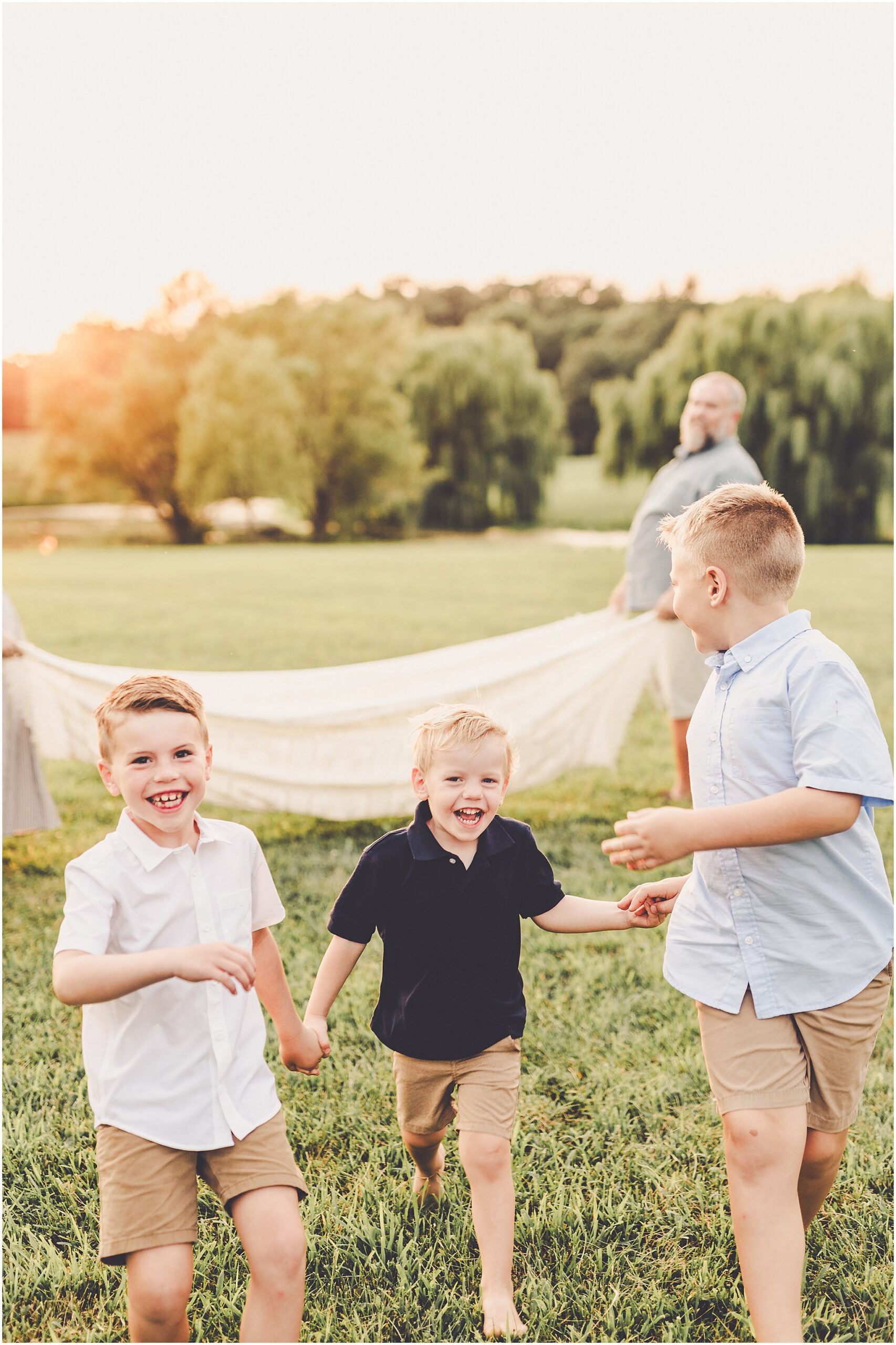 A Central Illinois summer family session with the Evans family filled with golden sunset light, backyard adventures, and genuine smiles.