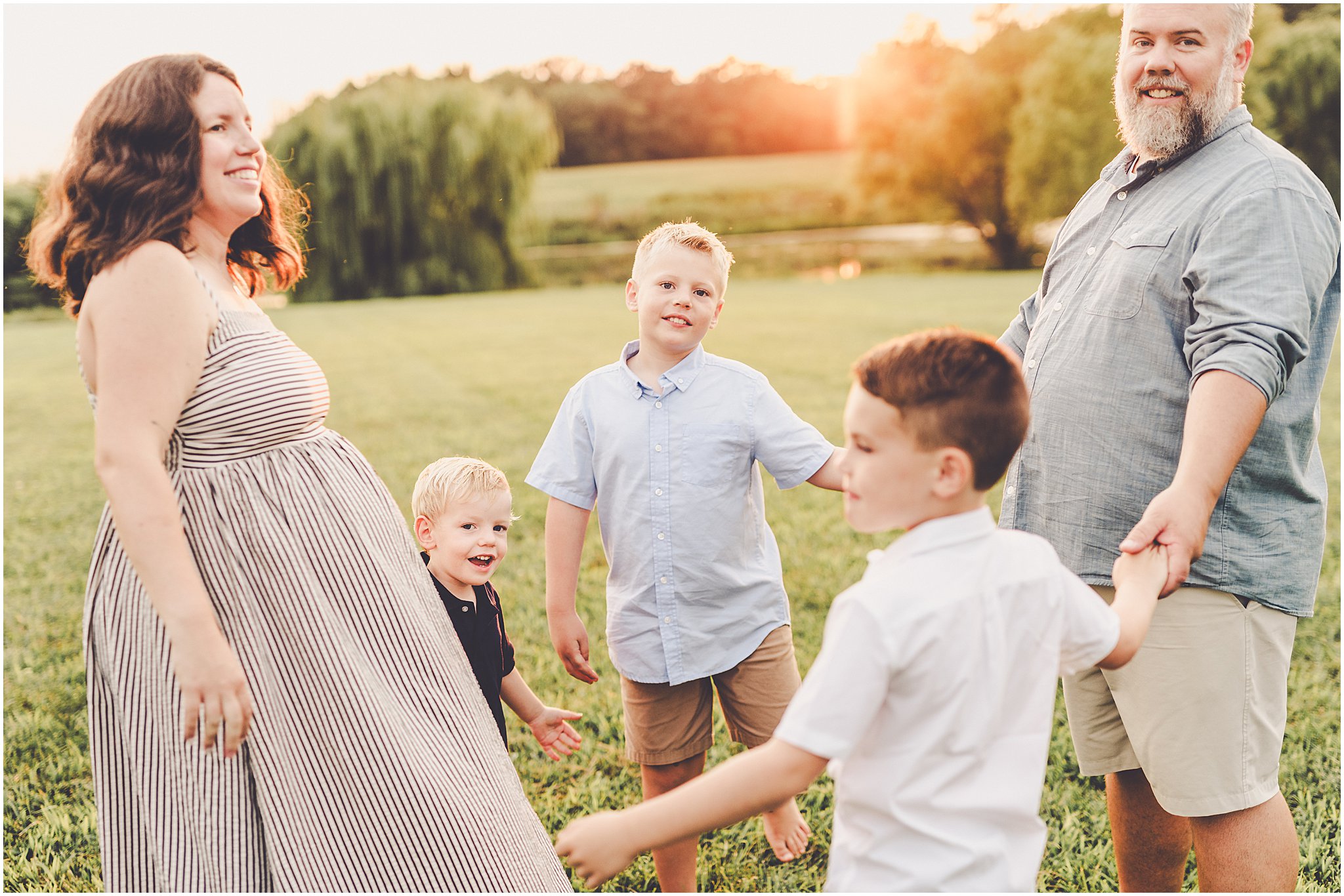 A Central Illinois summer family session with the Evans family filled with golden sunset light, backyard adventures, and genuine smiles.