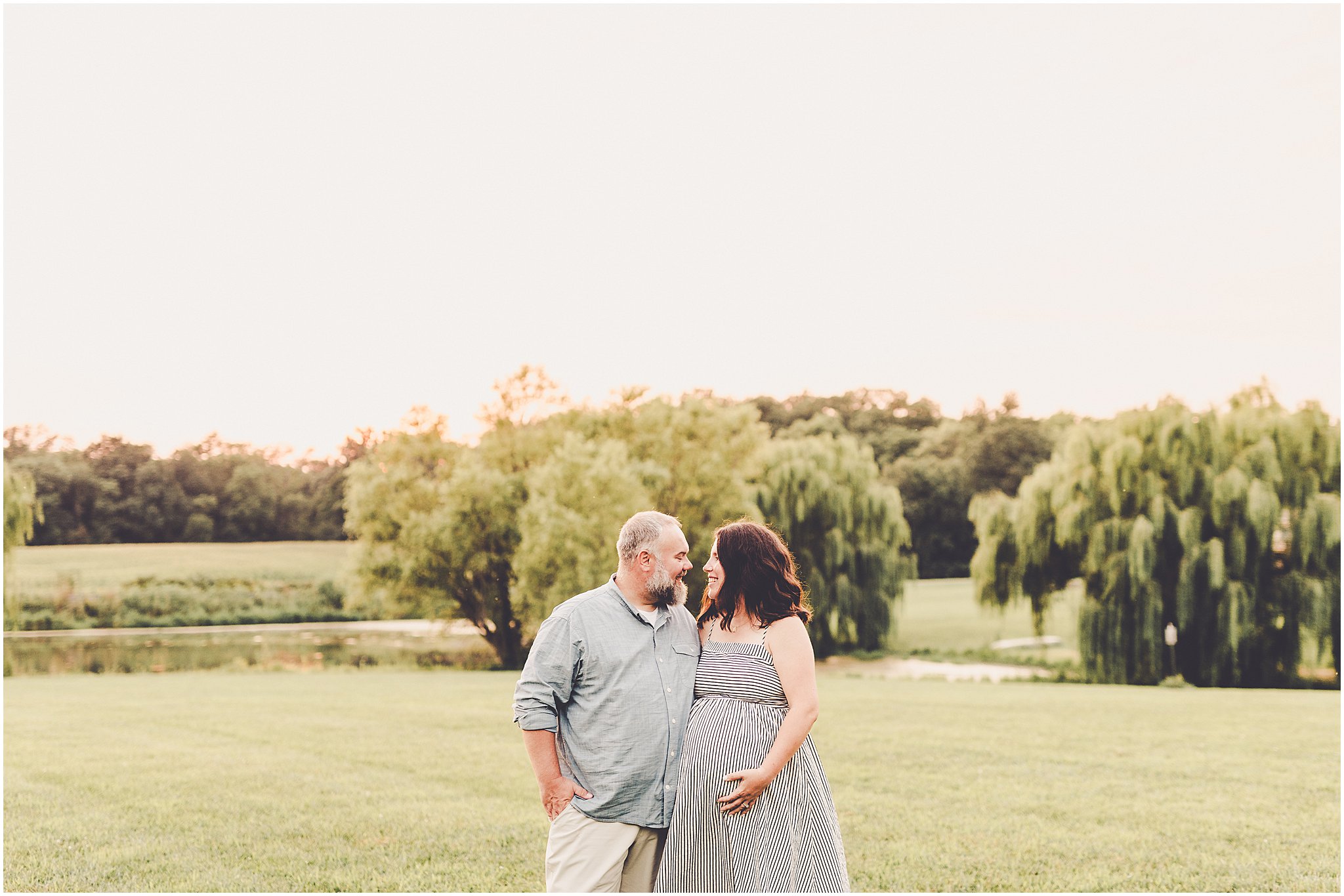 A Central Illinois summer family session with the Evans family filled with golden sunset light, backyard adventures, and genuine smiles.
