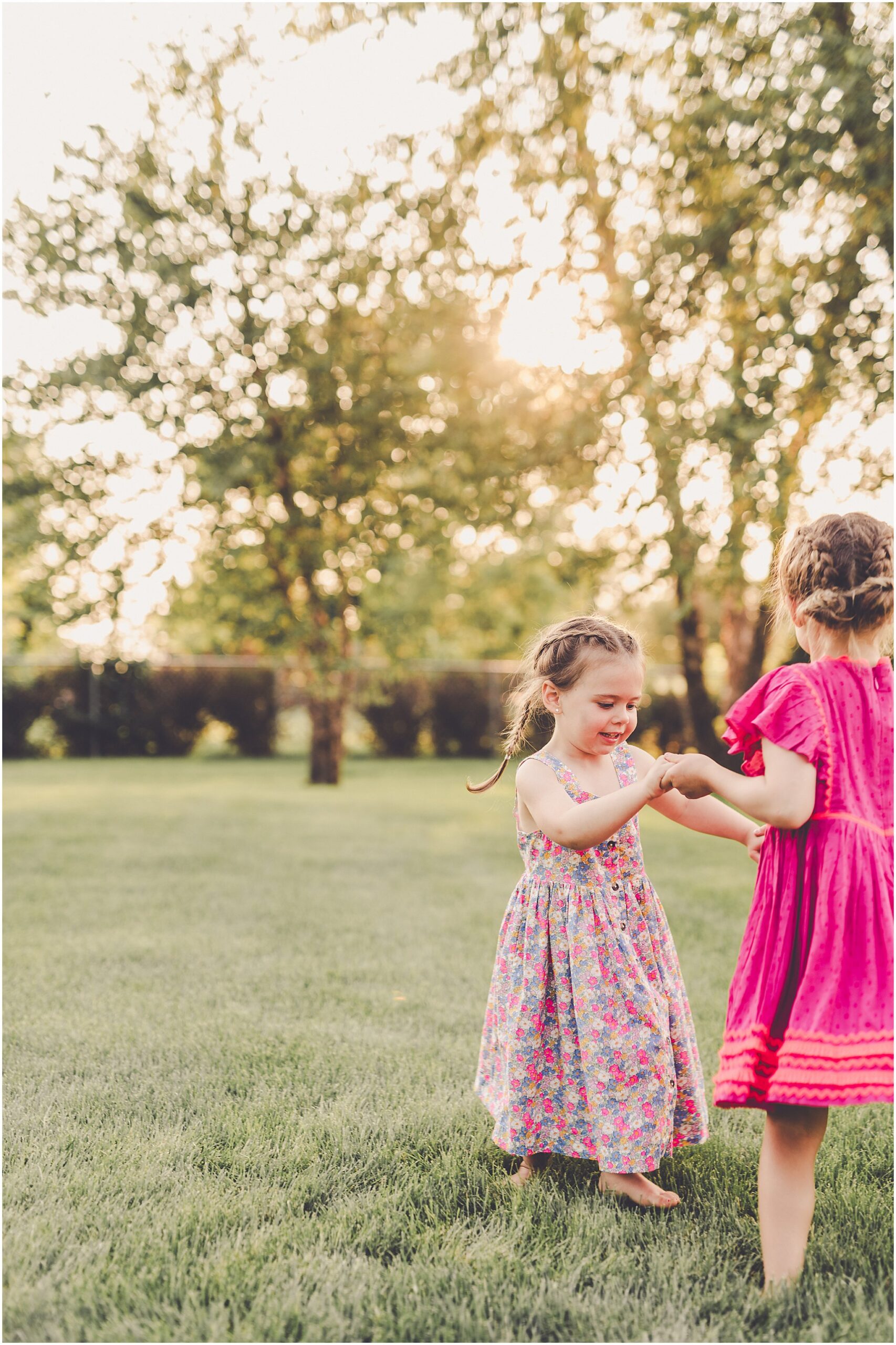 Celebrating baby Kambry's eight-month milestone with a playful, pink-filled summer backyard session in Kankakee County.
