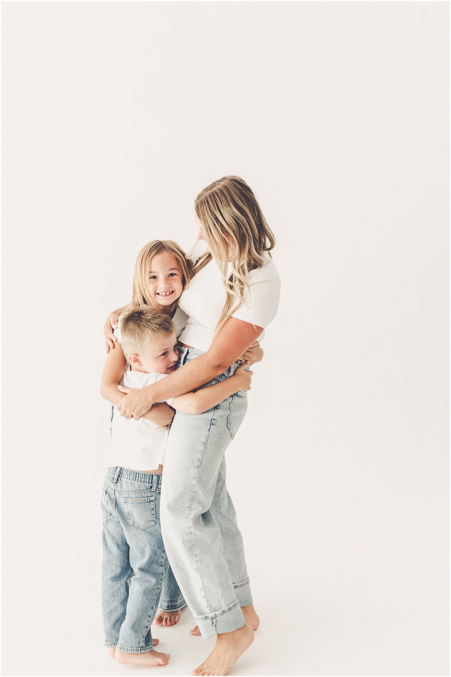 A simple & sweet studio session with the Foote family in Kankakee, Illinois, celebrating their growing kiddos with simple, playful portraits.