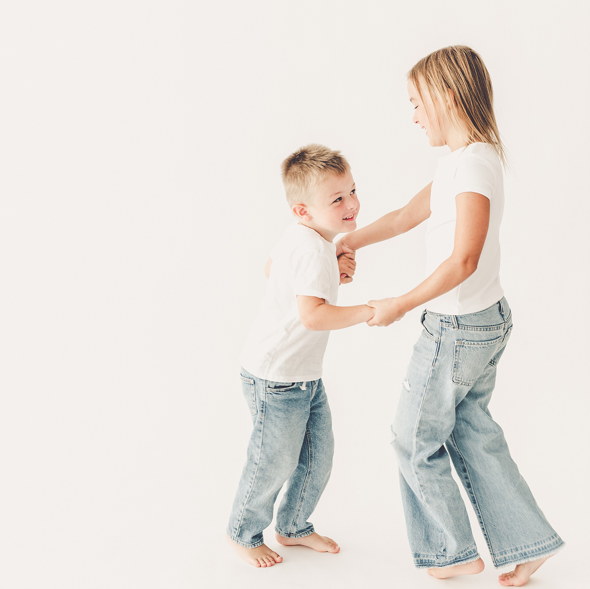 A simple & sweet studio session with the Foote family in Kankakee, Illinois, celebrating their growing kiddos with simple, playful portraits.