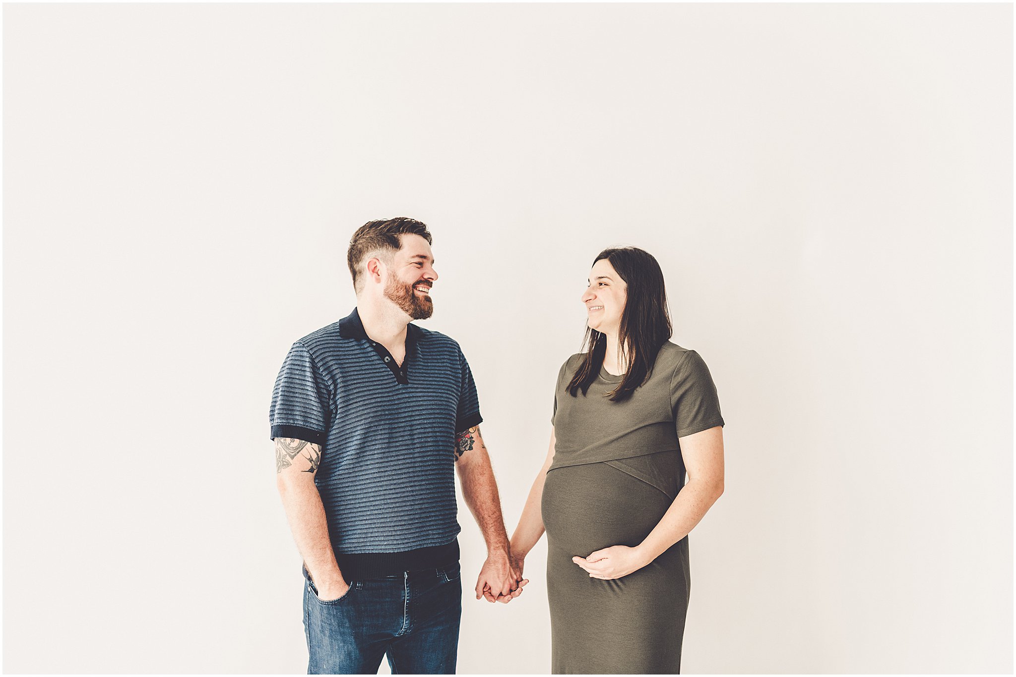 Michelle and Derek celebrate their growing family with a simple and sweet studio maternity session at Studio 388 in downtown Kankakee, Illinois.
