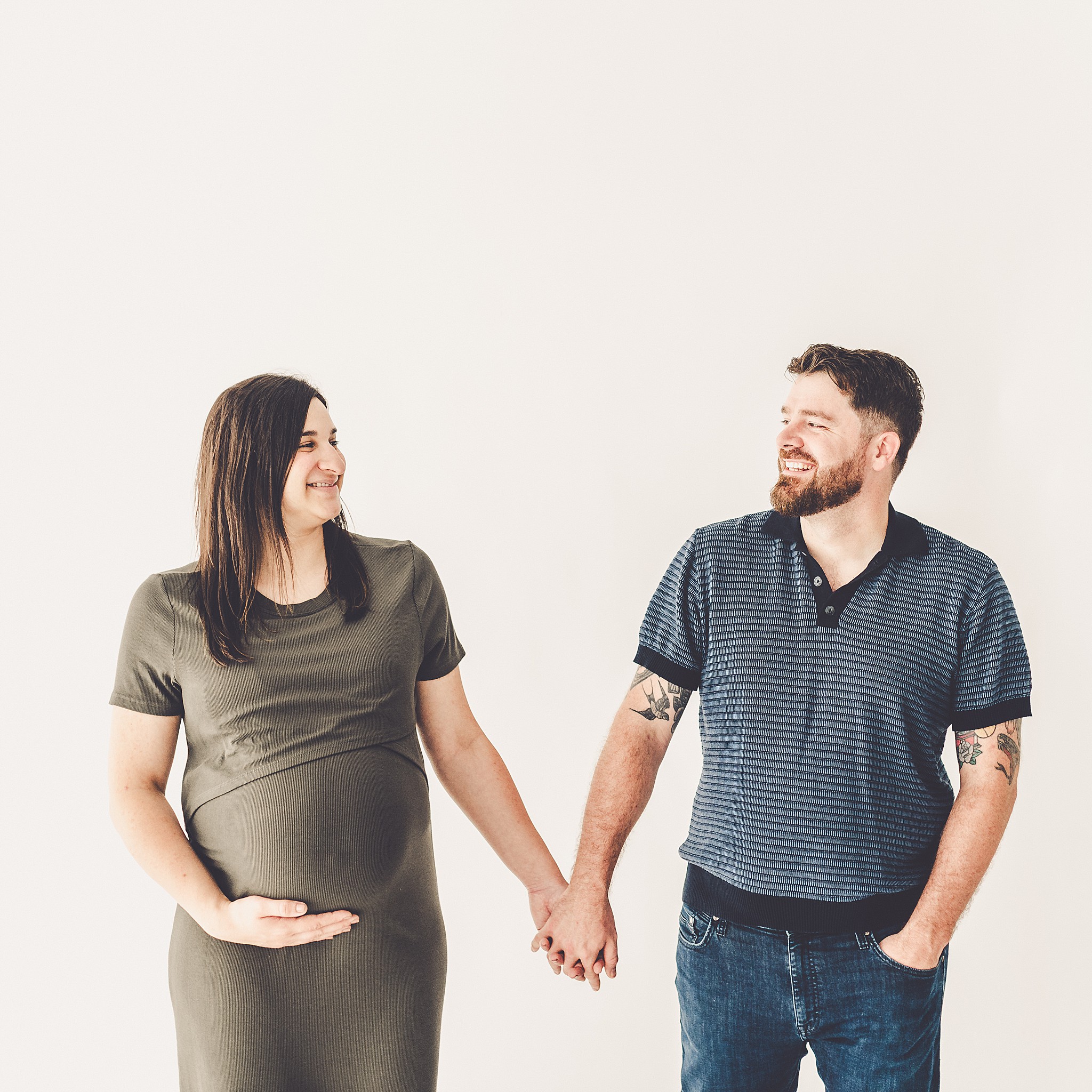 Michelle and Derek celebrate their growing family with a simple and sweet studio maternity session at Studio 388 in downtown Kankakee, Illinois.