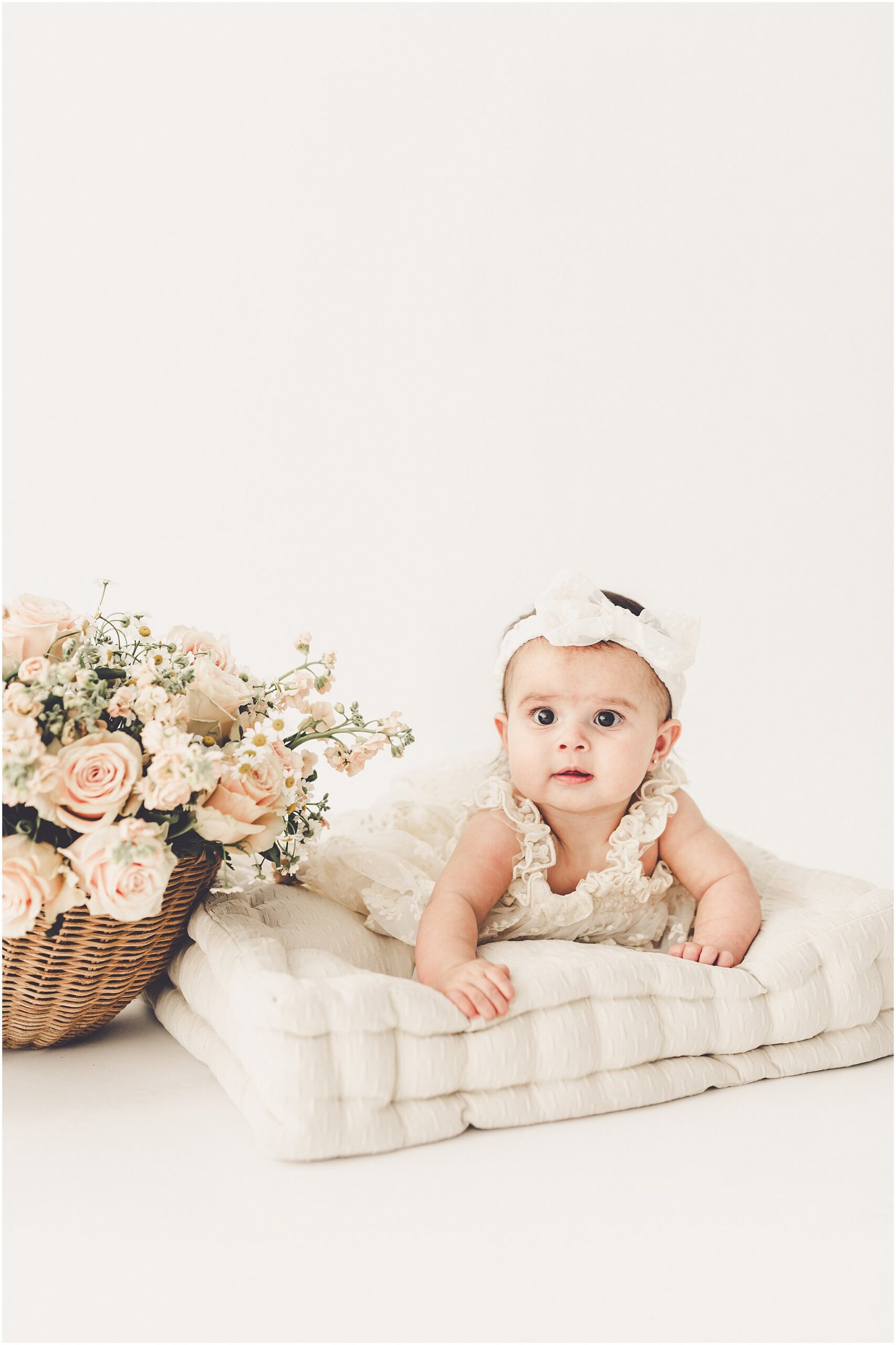 Kara Evans Photographer is a studio milestone photographer based in Kankakee at the natural light photography studio, Studio 388.