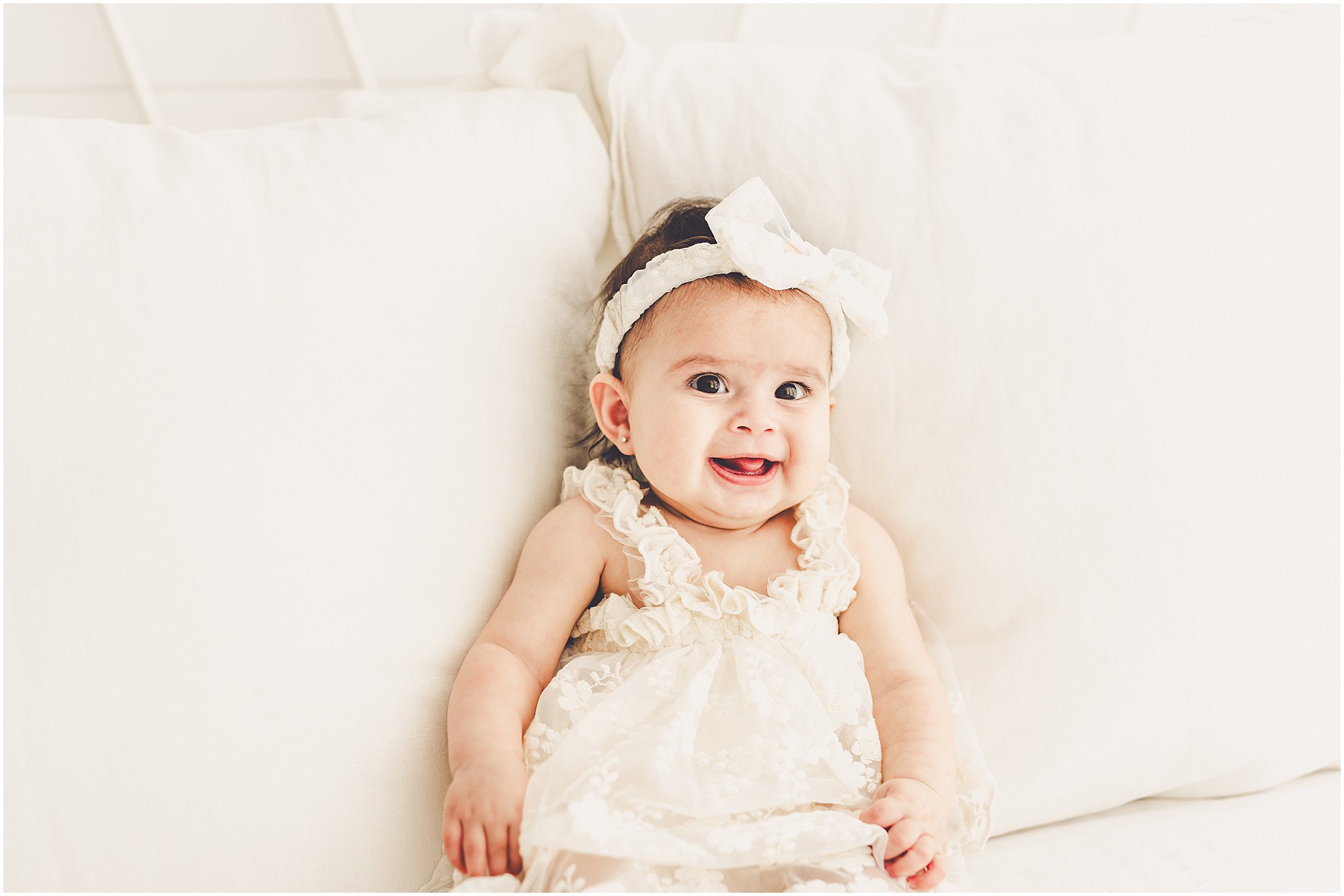 Kara Evans Photographer is a studio milestone photographer based in Kankakee at the natural light photography studio, Studio 388.