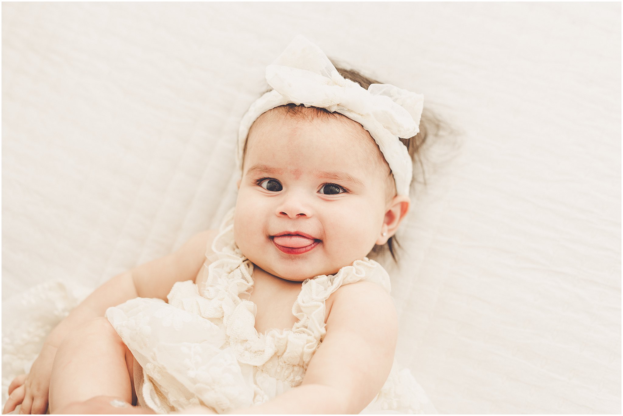 Kara Evans Photographer is a studio milestone photographer based in Kankakee at the natural light photography studio, Studio 388.