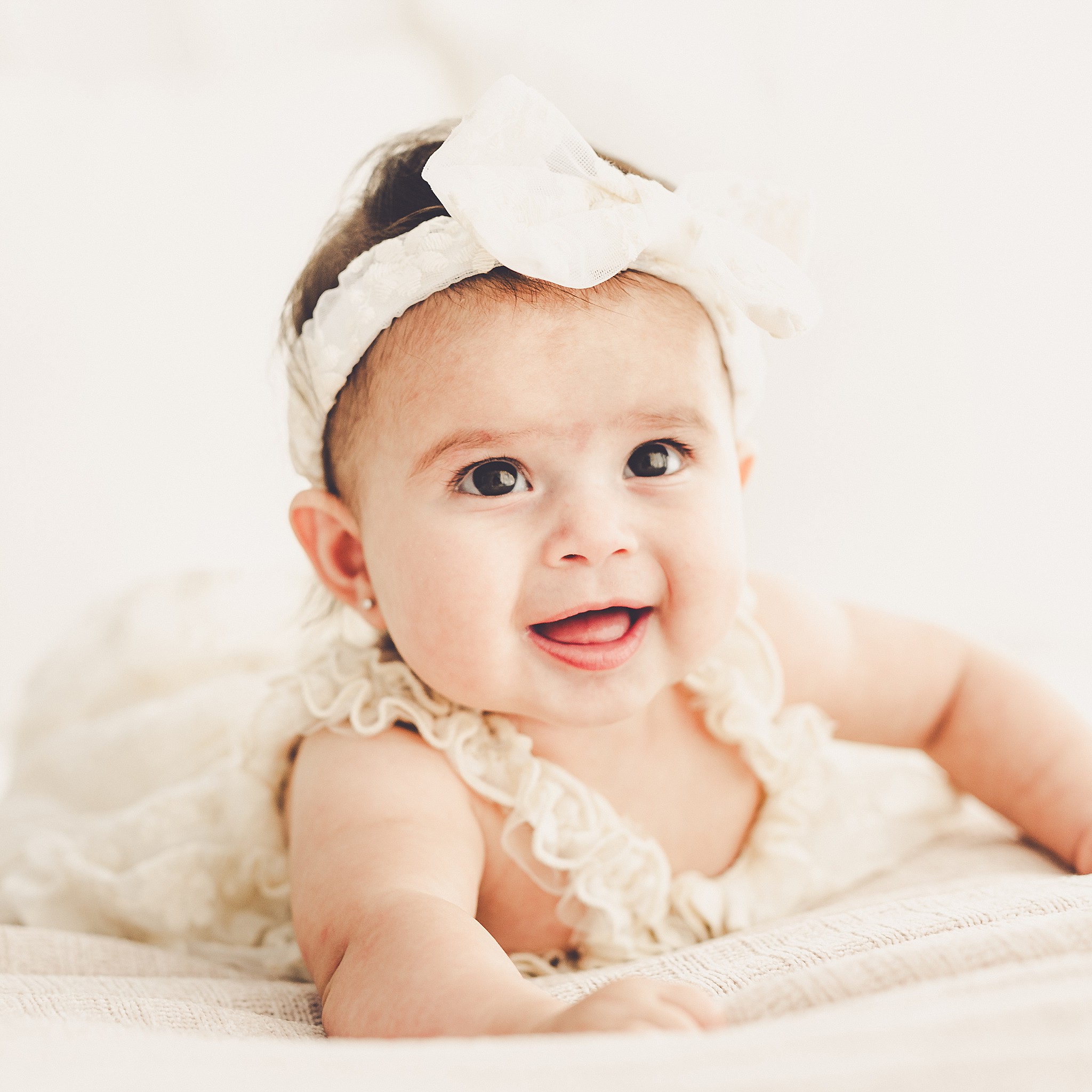 Kara Evans Photographer is a studio milestone photographer based in Kankakee at the natural light photography studio, Studio 388.
