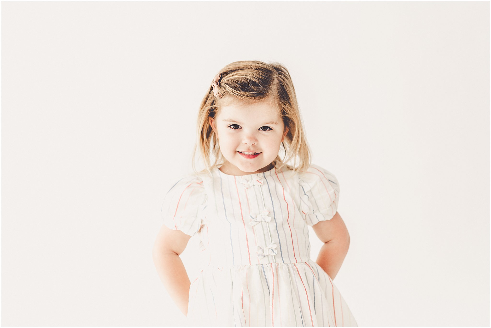 Inspiration for studio three-year milestone photos with Kankakee family and milestone photographer Kara Evans Photographer.