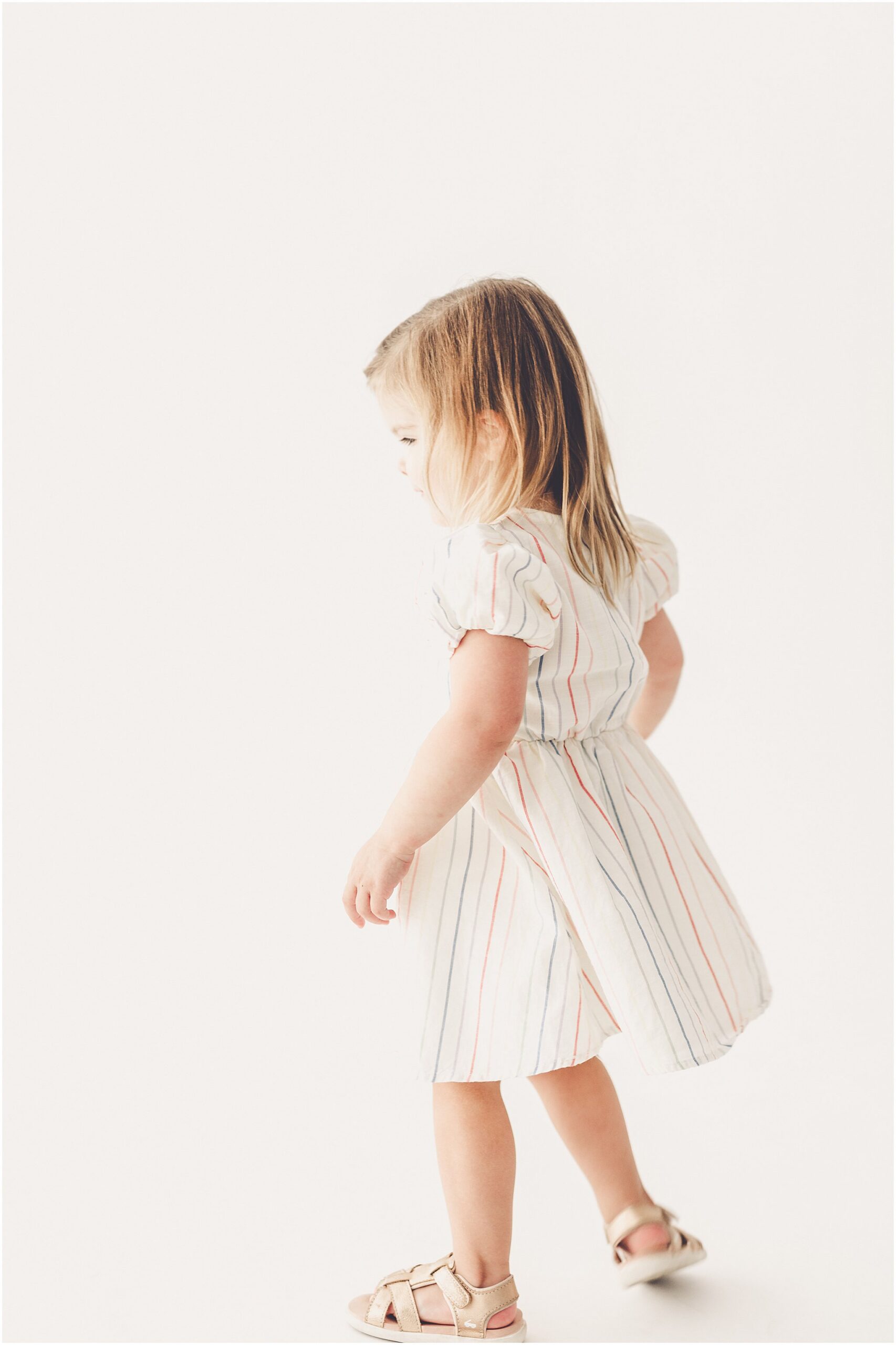 Inspiration for studio three-year milestone photos with Kankakee family and milestone photographer Kara Evans Photographer.
