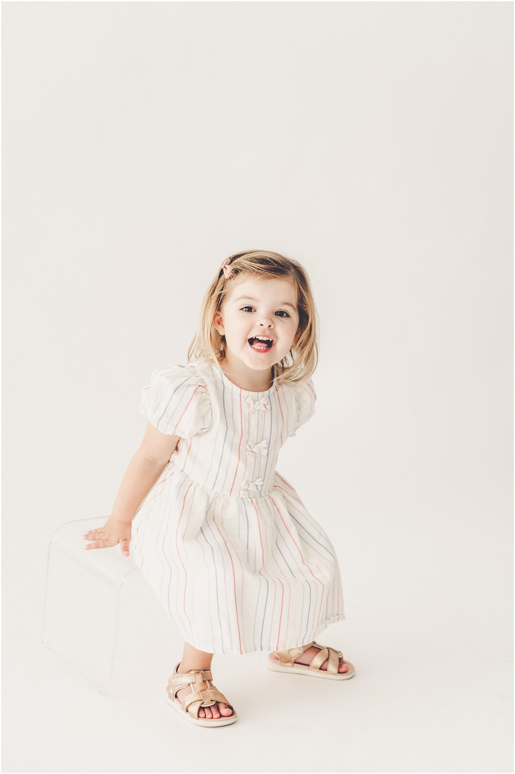 Inspiration for studio three-year milestone photos with Kankakee family and milestone photographer Kara Evans Photographer.