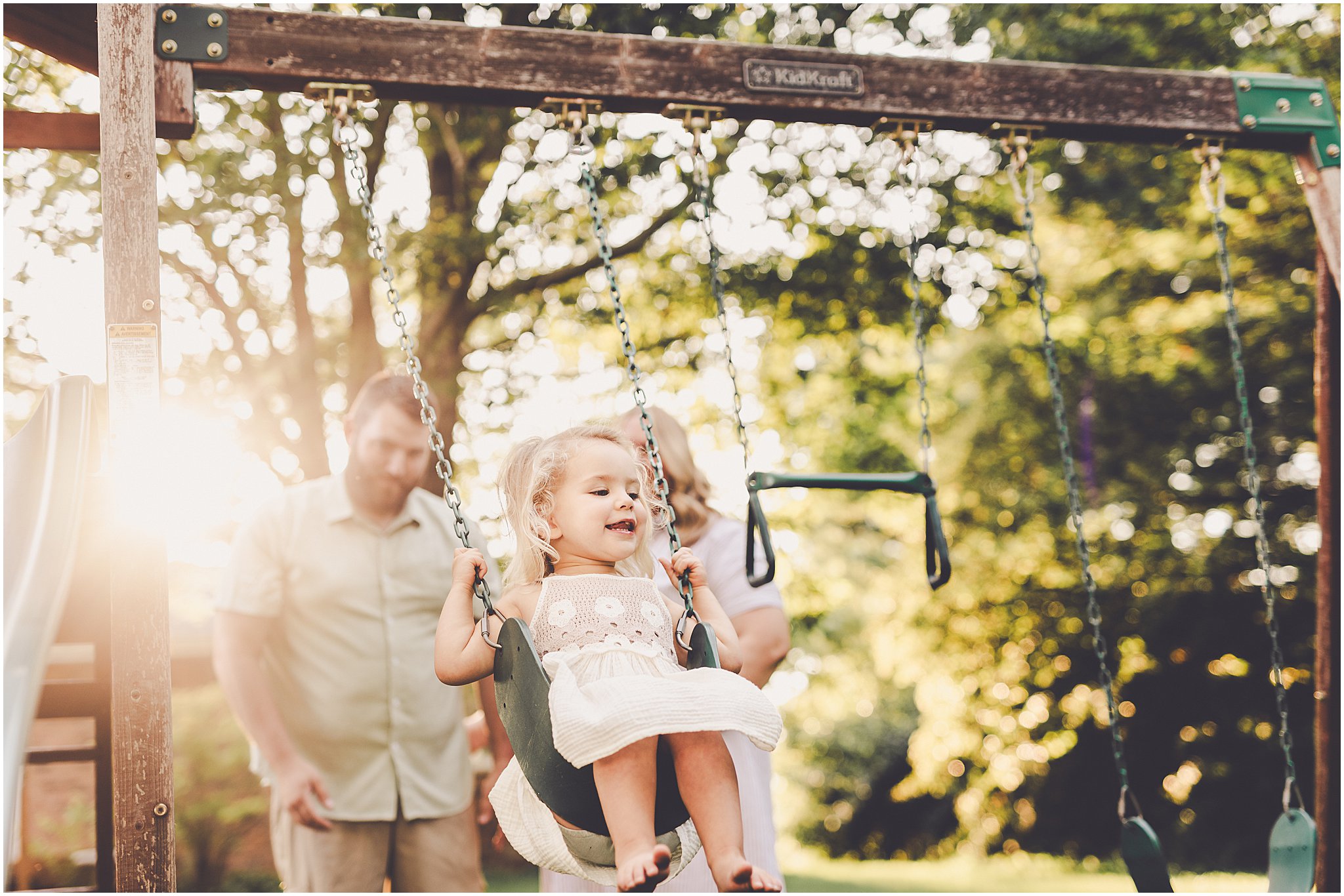 A summer backyard sunset session with the Cowsert family photographed by Iroquois County family photographer Kara Evans Photographer.