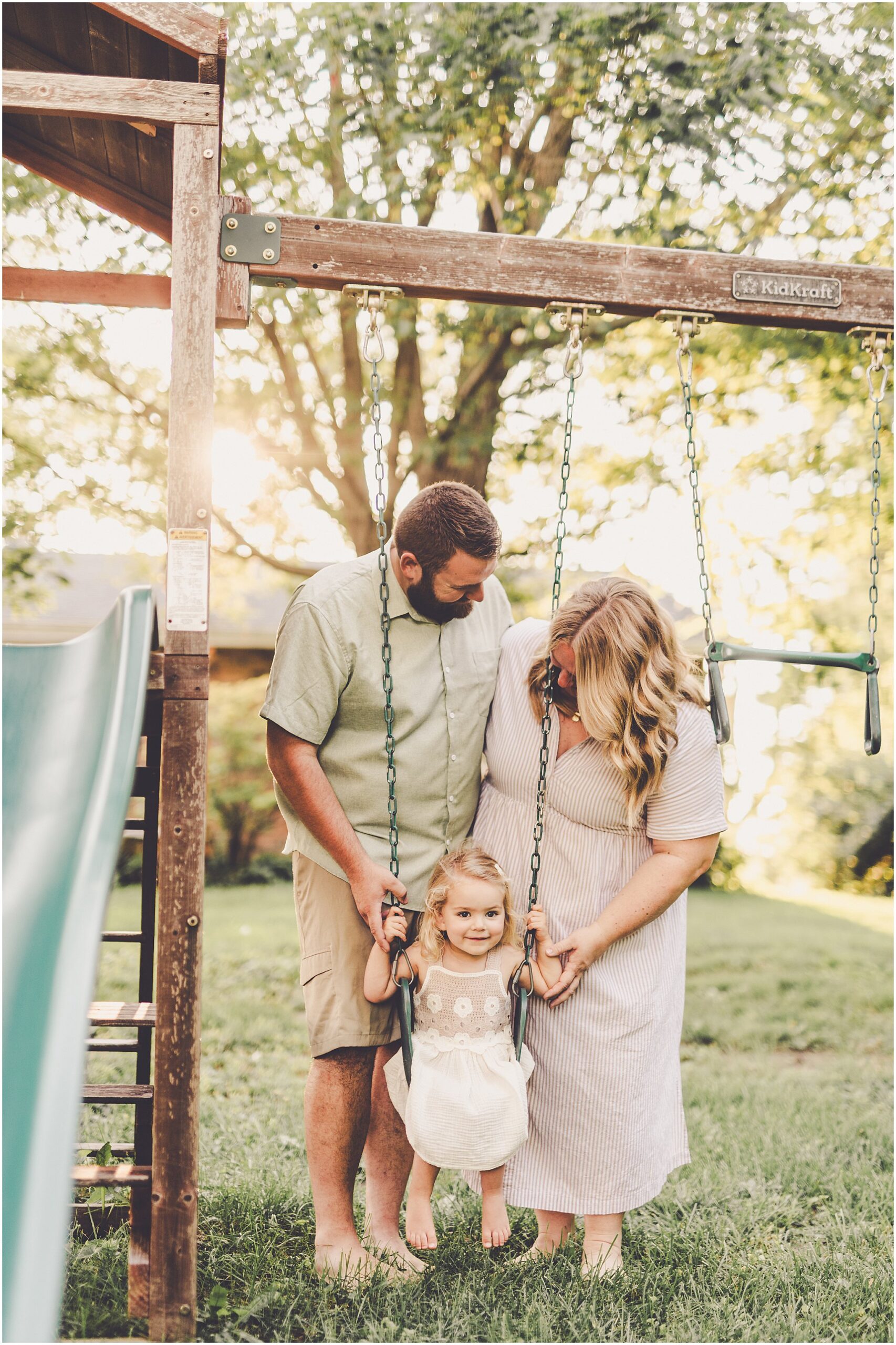 A summer backyard sunset session with the Cowsert family photographed by Iroquois County family photographer Kara Evans Photographer.