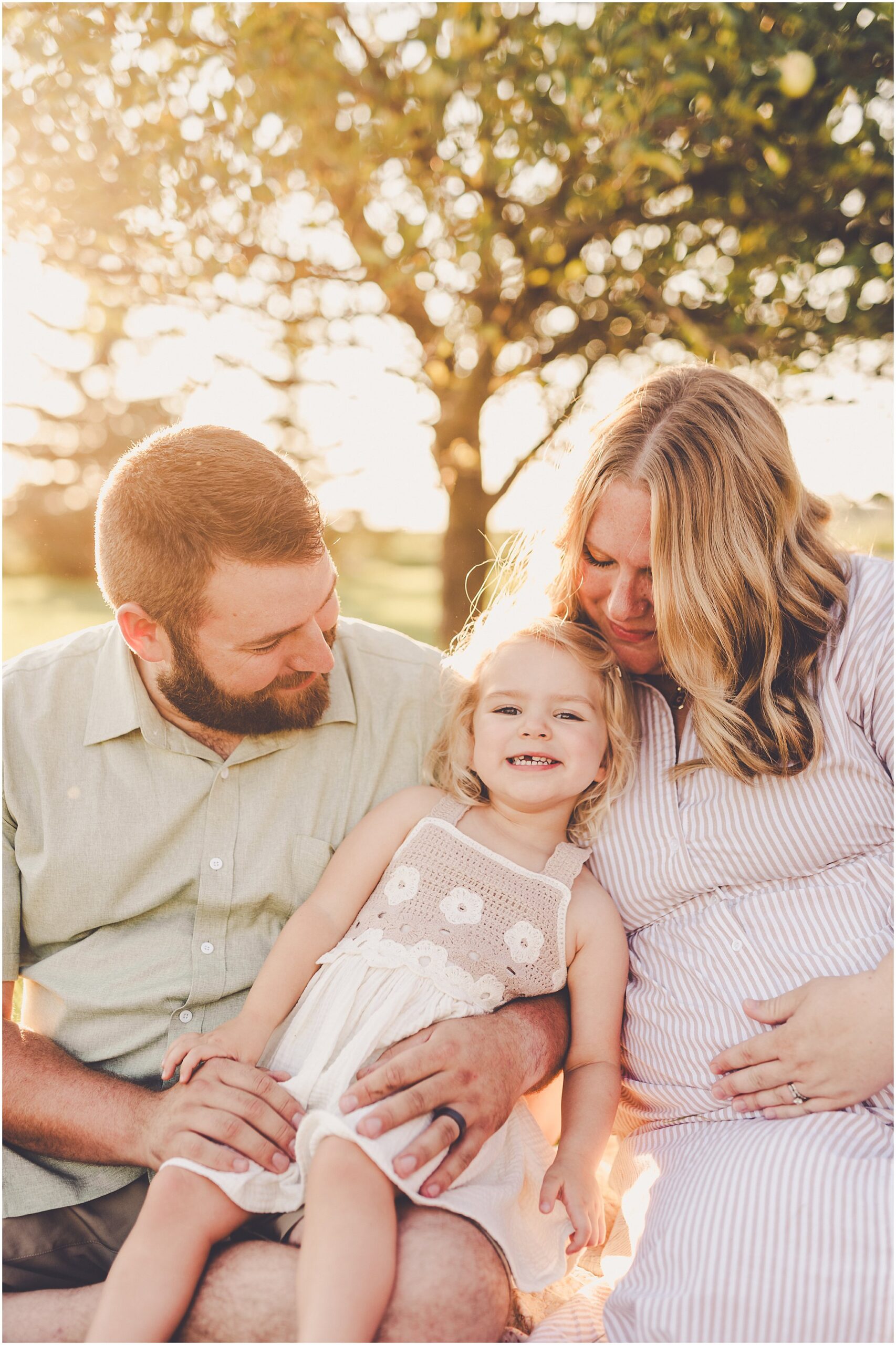 A summer backyard sunset session with the Cowsert family photographed by Iroquois County family photographer Kara Evans Photographer.