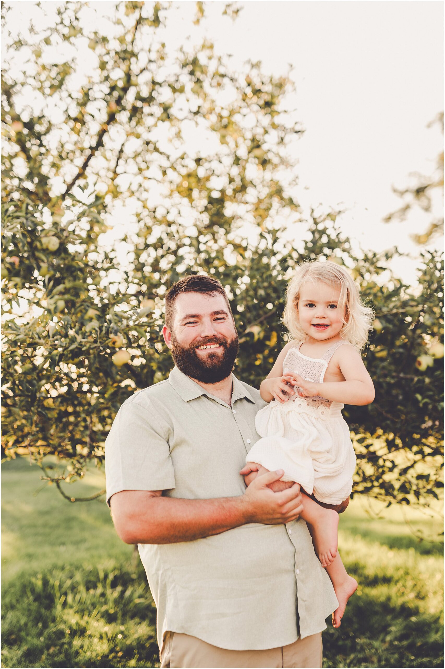 A summer backyard sunset session with the Cowsert family photographed by Iroquois County family photographer Kara Evans Photographer.
