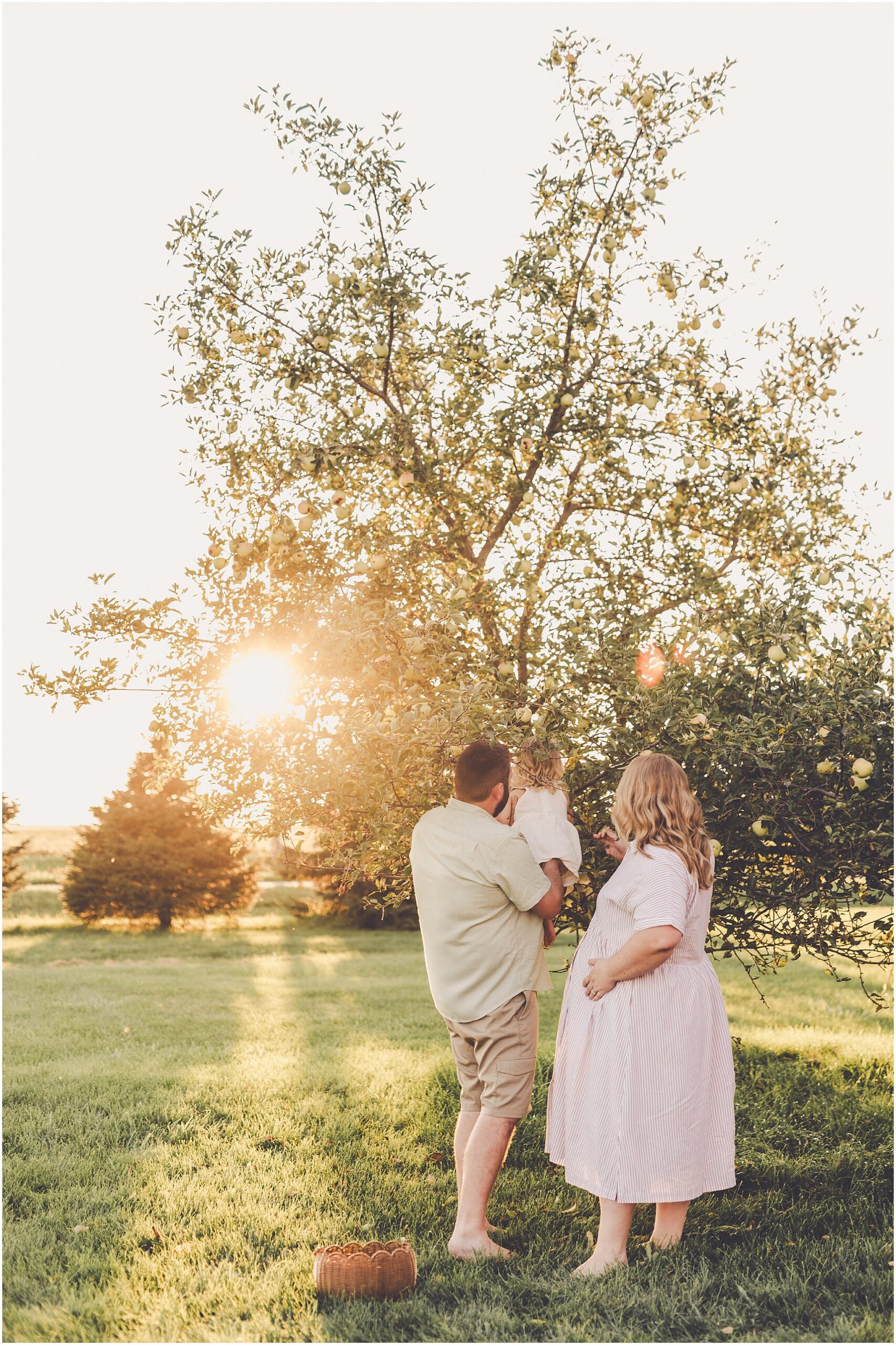 A summer backyard sunset session with the Cowsert family photographed by Iroquois County family photographer Kara Evans Photographer.